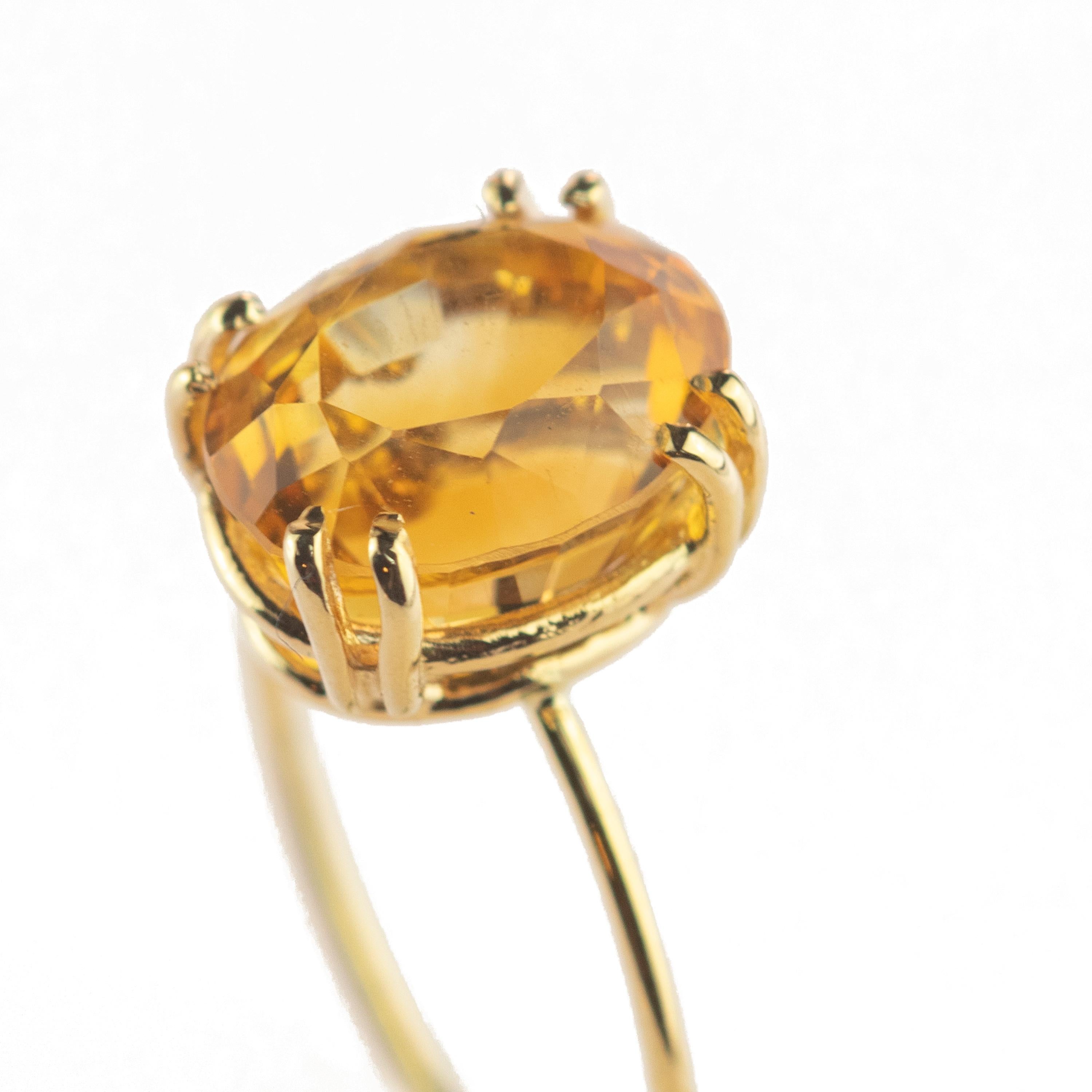 This extraordinary citrine quartz (4 carats) ring. All artfully set and crafted in 9k yellow gold to create this stunning piece of jewelry. This artwork is for a fresh, young and modern woman.
 
Inspired by the sun, the quartz resembles the fire