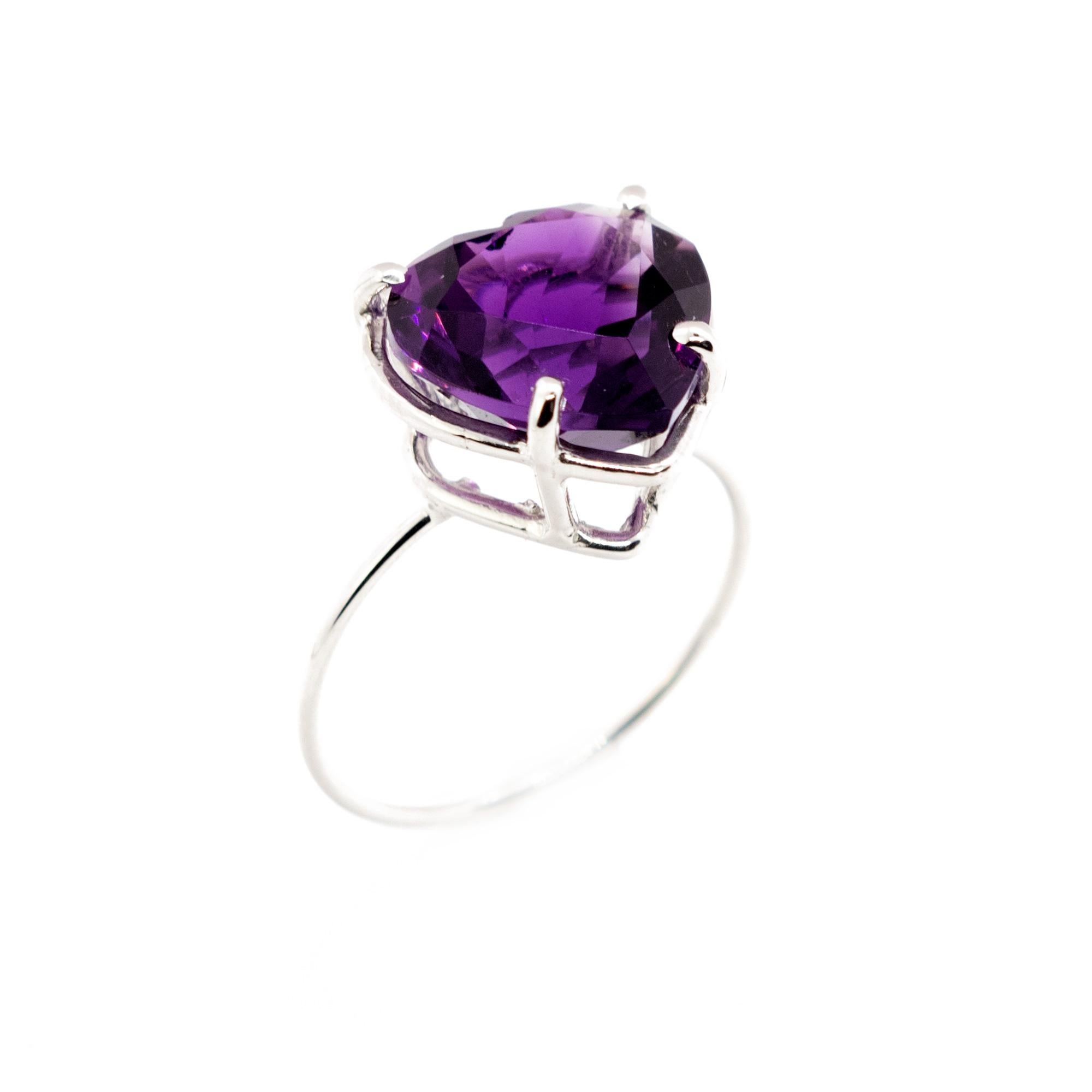 Marvellous handmade 18 karat white gold band thin ring embellished with a wonderful heart shaped Amethyst. Open your intuition and enhance your senses to love. 

Inspired by strong feeling of love. The beating heart is used as an intensive form of