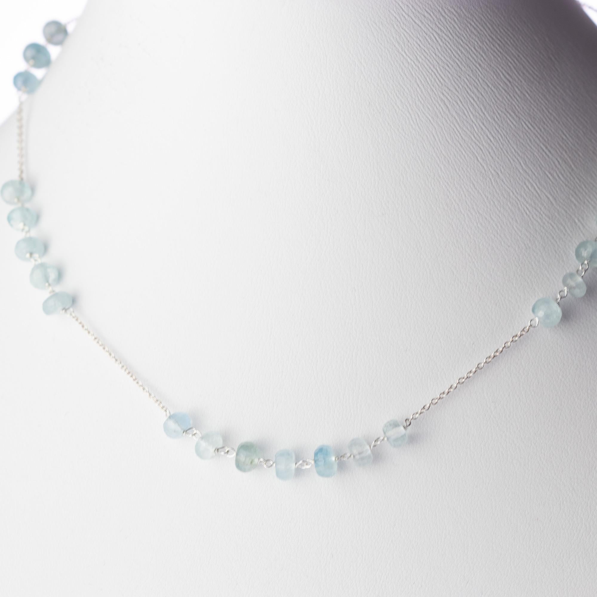 Magnificent natural precious jewellery on elegant 18 karat white gold setting. Marvellous necklace starring pure aquamarine raw rondelles, for a bright charm of uniqueness.

An elegant touch of glamour at your fingertips. Let yourself be tempted by