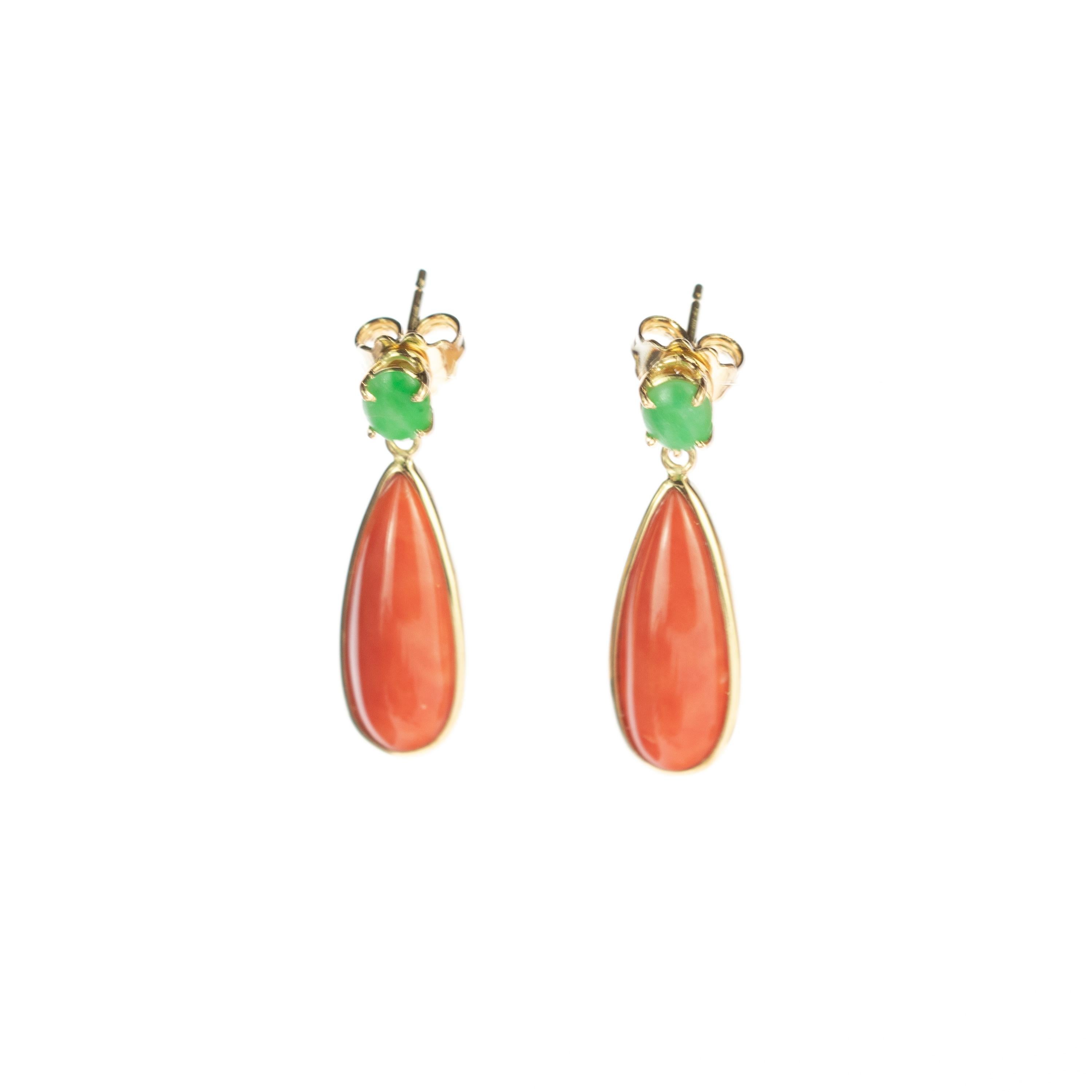 Magnificent cammeo salmon coral and natural jade earrings surrounded by delicate 18 karat yellow gold details. Evoking all the italian tradition resulting in a stunning masterpiece with an outstanding display of color and a high quality