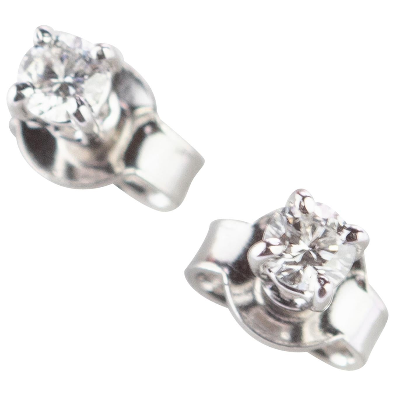 Intini Jewels Clous d
oreilles Point of Light en or blanc 18 carats et diamants