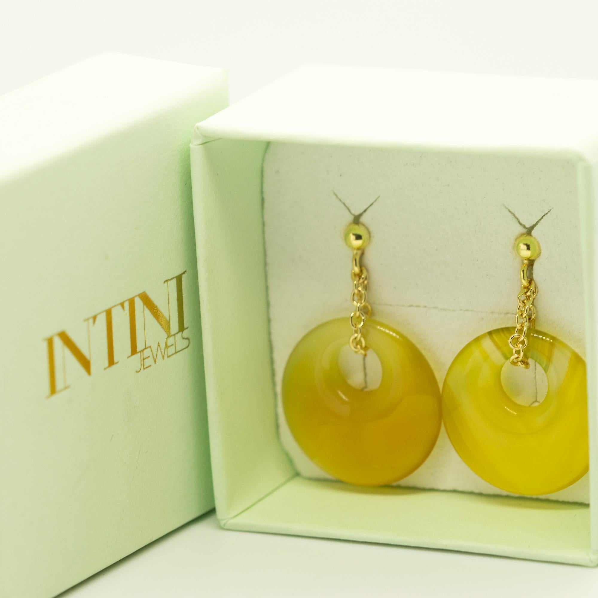 Intini Jewels signature quality on a modern and contemporary design jewel. 

An elegant touch of glamour at your fingertips. Let yourself be tempted by a unique Made in Italy style.

Youthful and colourful earrings for your daily dose of style and
