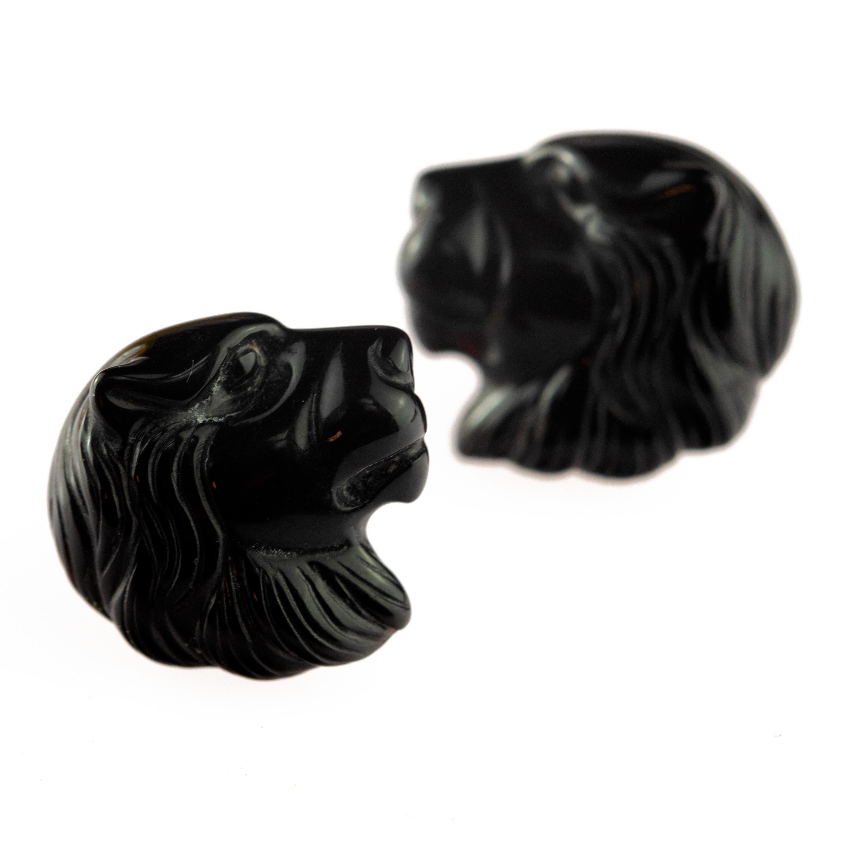 Stunning black agate stud earrings. Modern carved lion head design that evokes the italian handmade traditional jewelry work, wrapping itself in a strong look enriched with Gold Plate manifesting glamour and exquisite taste.

Inspired by the lion