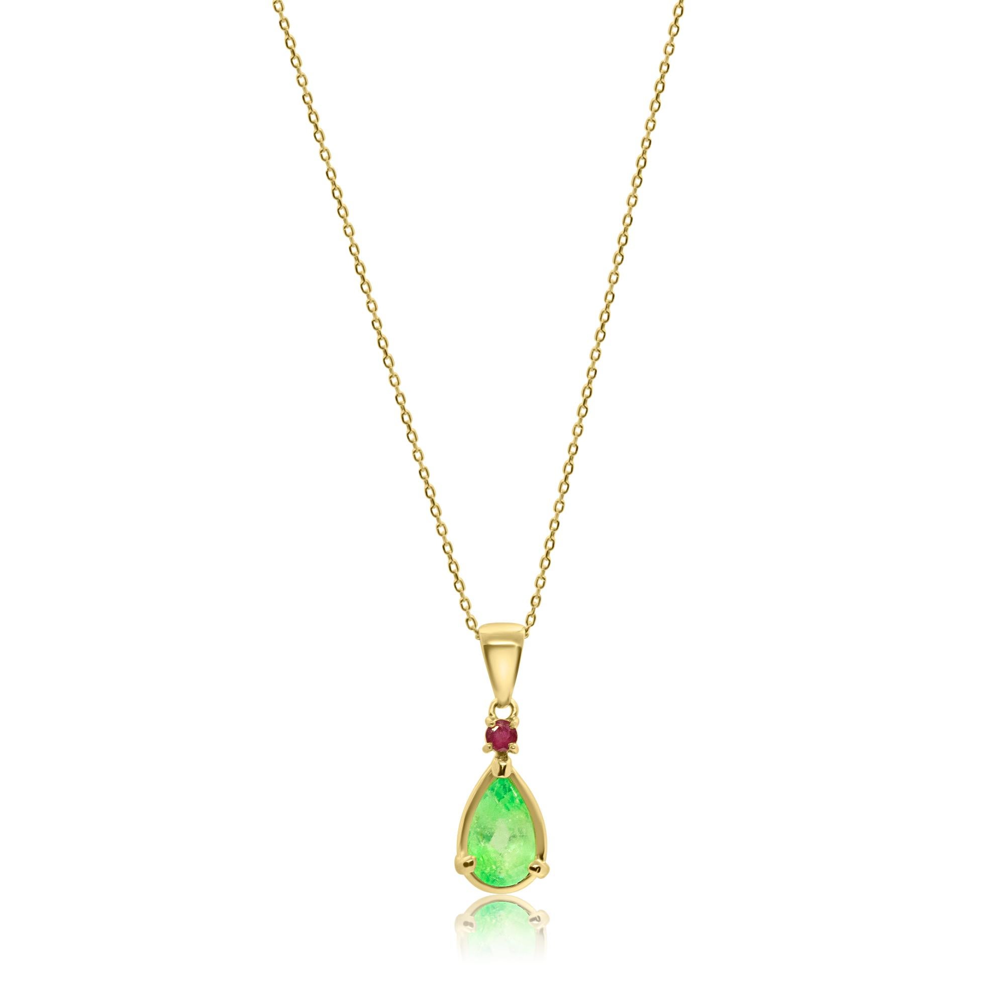 Cocktail jewellery in 18 karat yellow gold, featuring a stunning Colombian Natural Emerald and Precious Ruby. The perfect handmade jewellery for an unforgettable cocktail night.
 
A luxurious and unique pendant necklace, featuring rare and precious