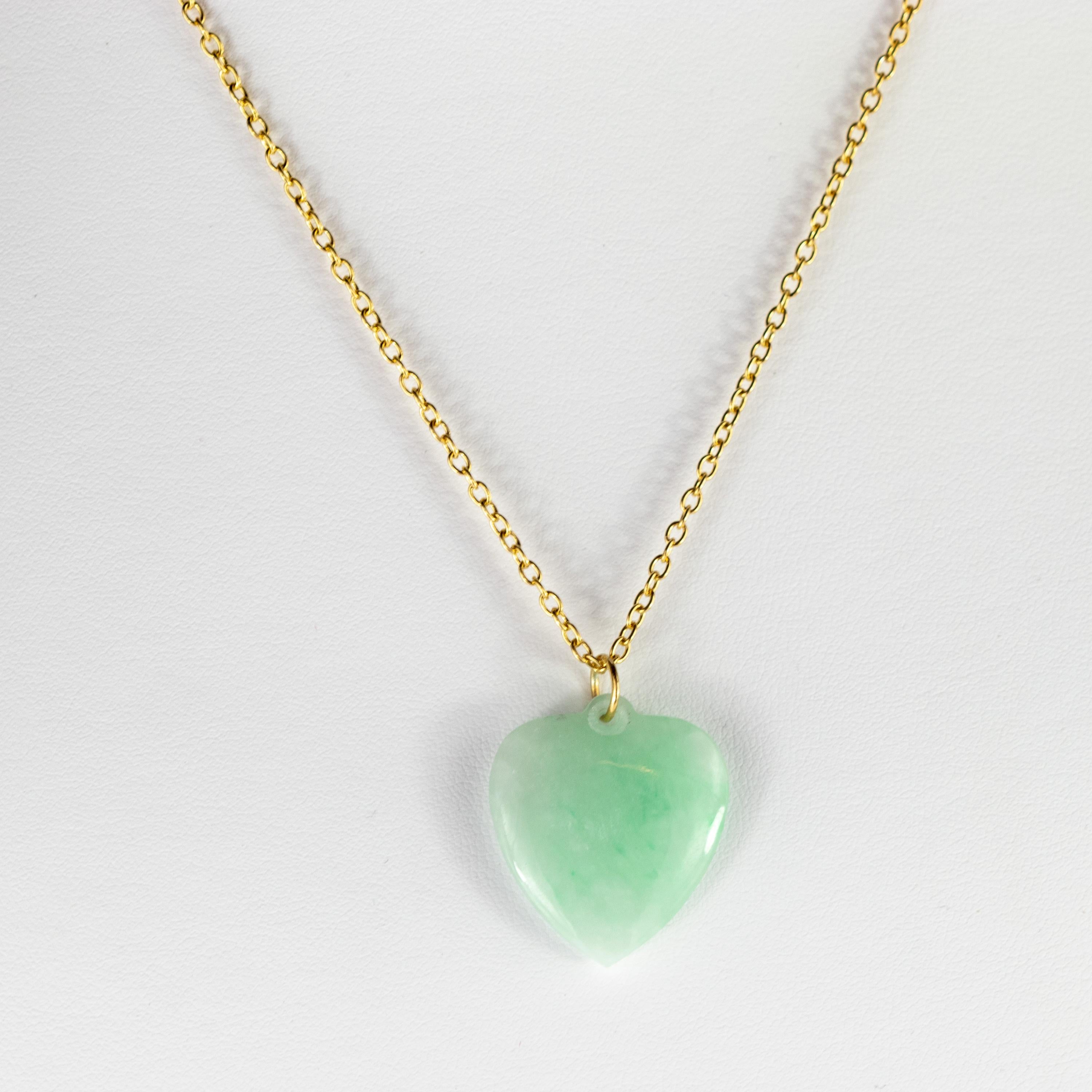Take love with you everywhere! This breathtaking necklace has a sweet design with the most precious gemstone hanging from a delicate 18 karat yellow gold chain. The Natural 29 carats Jade activates spiritual awareness, opens intuition and enhances