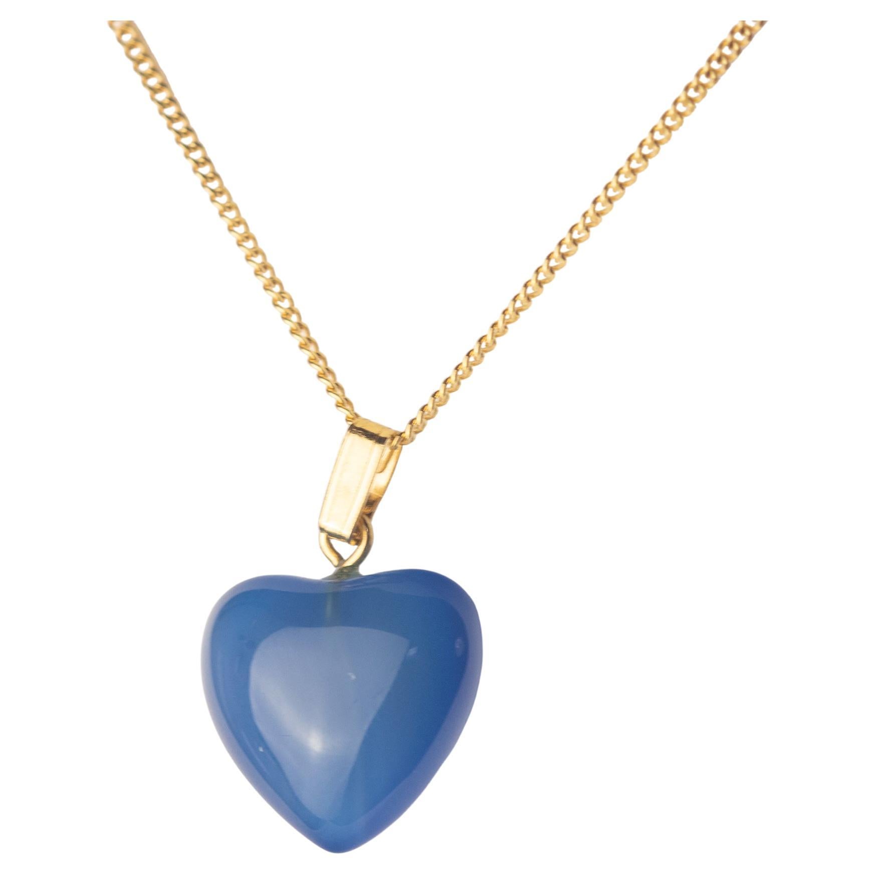 Take love with you everywhere! This breathtaking necklace has a sweet design with the most precious gemstone hanging from a delicate 9 karat gold chain. The Natural Blue Quartzactivates spiritual awareness, opens intuition and enhances your senses