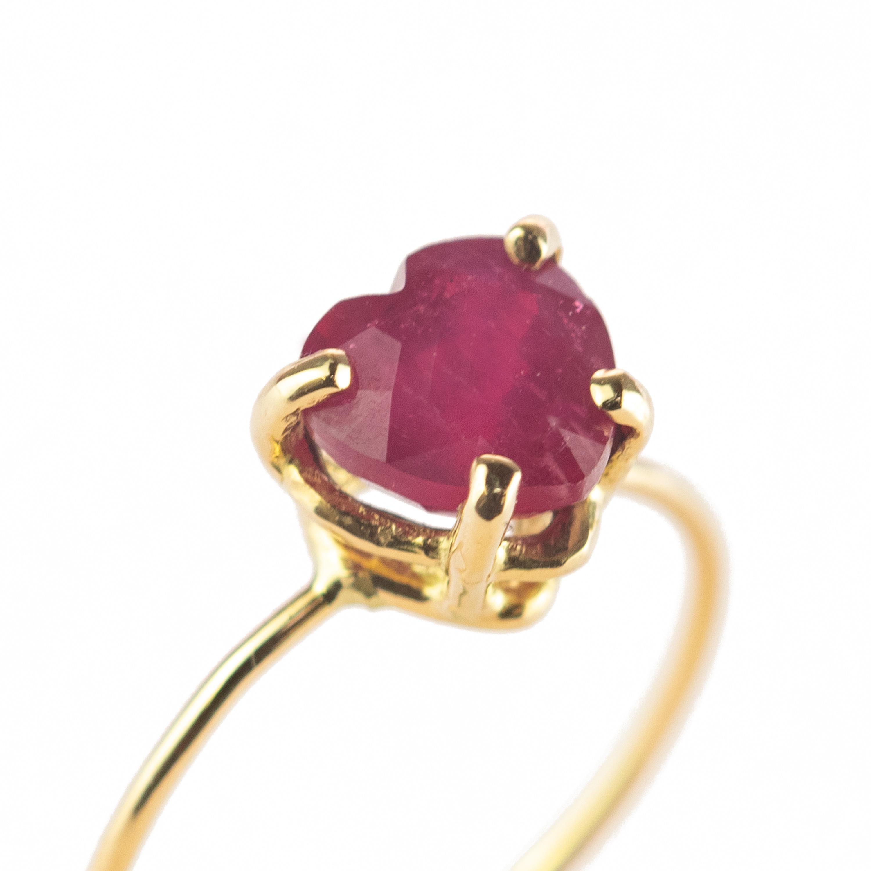 Marvelous handmade 18 karat yellow gold band thin ring embellished with a wonderful heart shaped Ruby. Open your intuition and enhance your senses to love. 

Inspired by strong feeling of love. The beating heart is used as an intensive form of the
