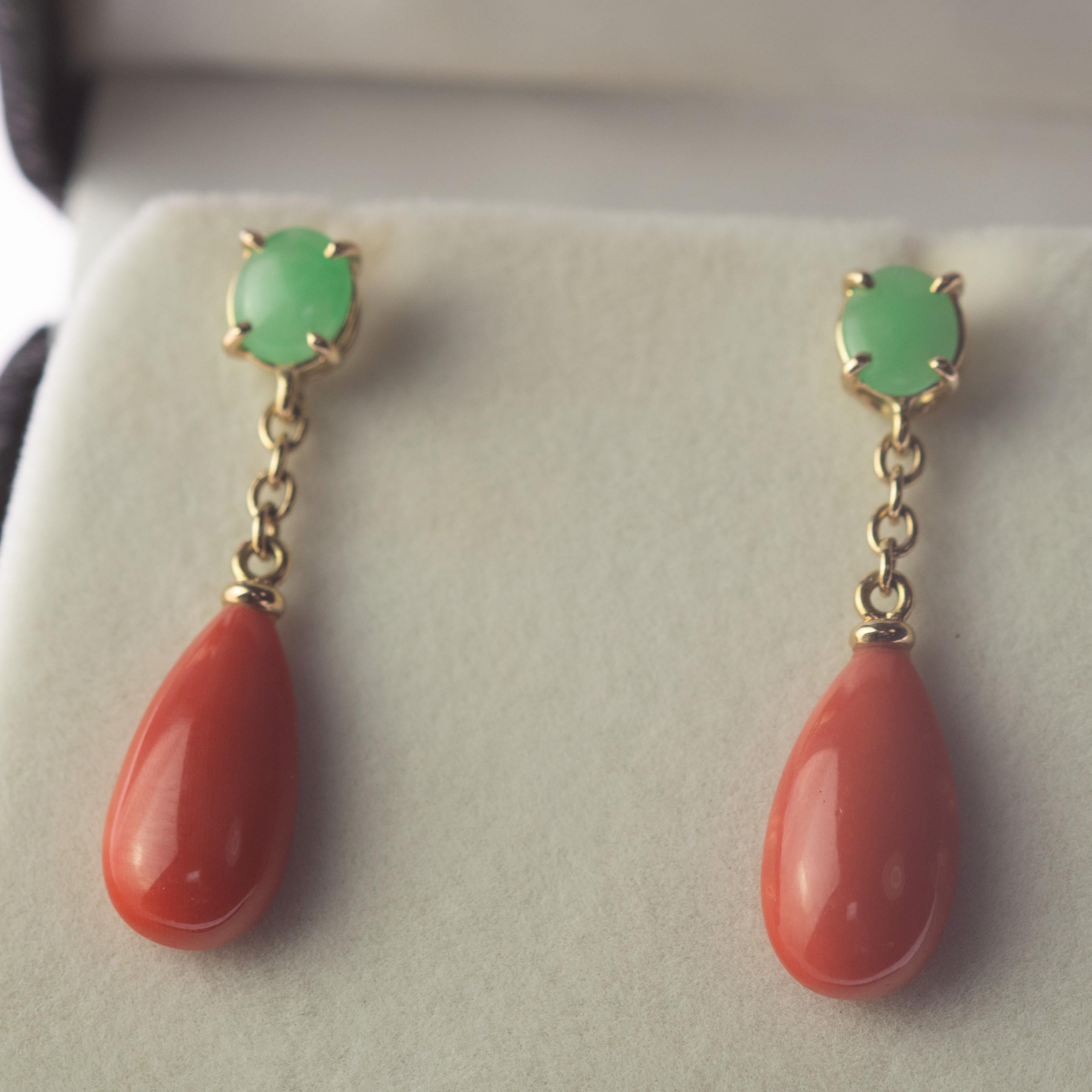 Magnificent cammeo salmon coral and natural jade earrings surrounded by delicate 18 karat yellow gold details. Evoking all the italian tradition resulting in a stunning masterpiece with an outstanding display of color and a high quality