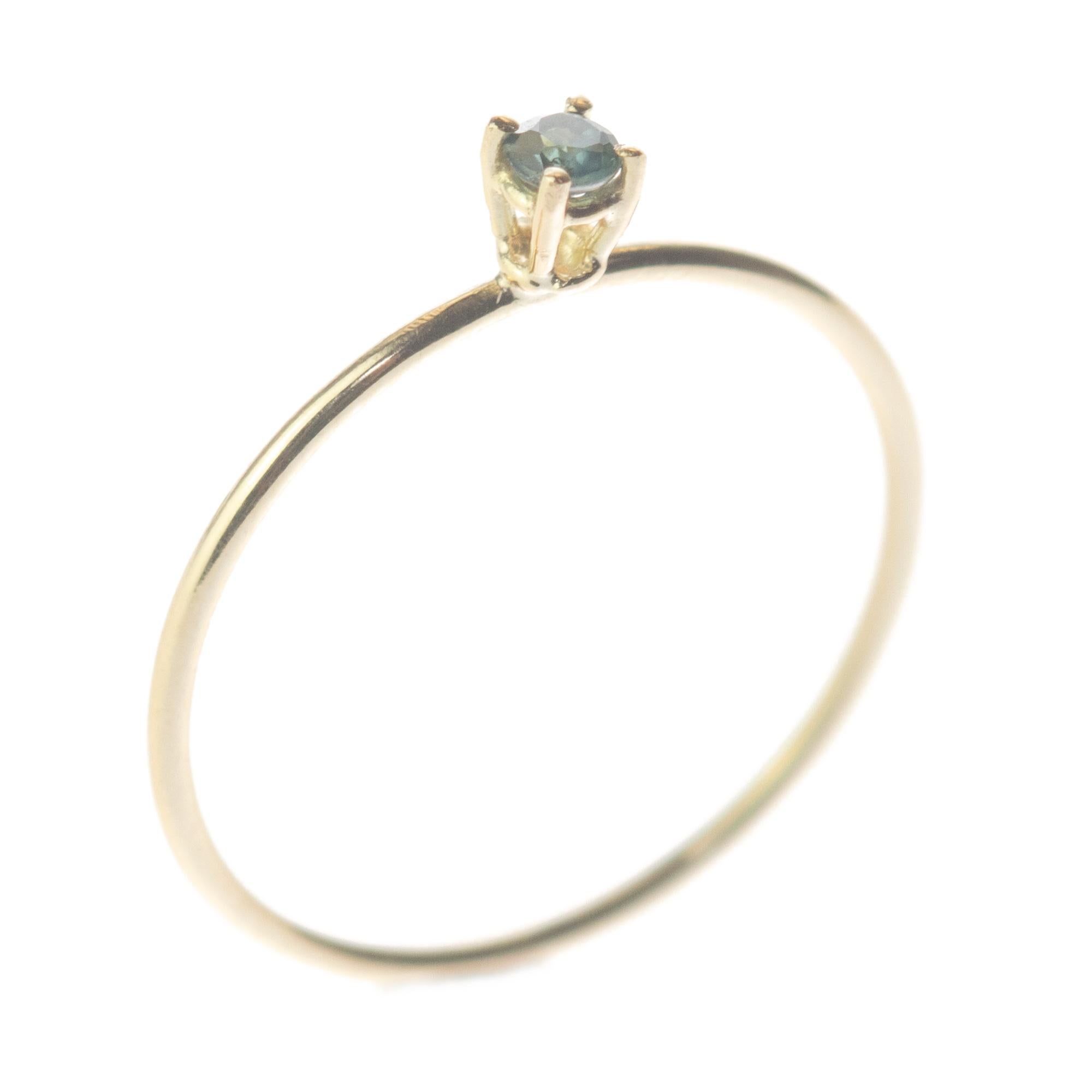 Signature INTINI Jewels blue sapphire jewellery. Modern and elegant ring design in 9k yellow gold with an brilliant cut with tiny griffes sormounting the ring.

Blue sapphires signified the height of celestial faith and hope in the ancient and