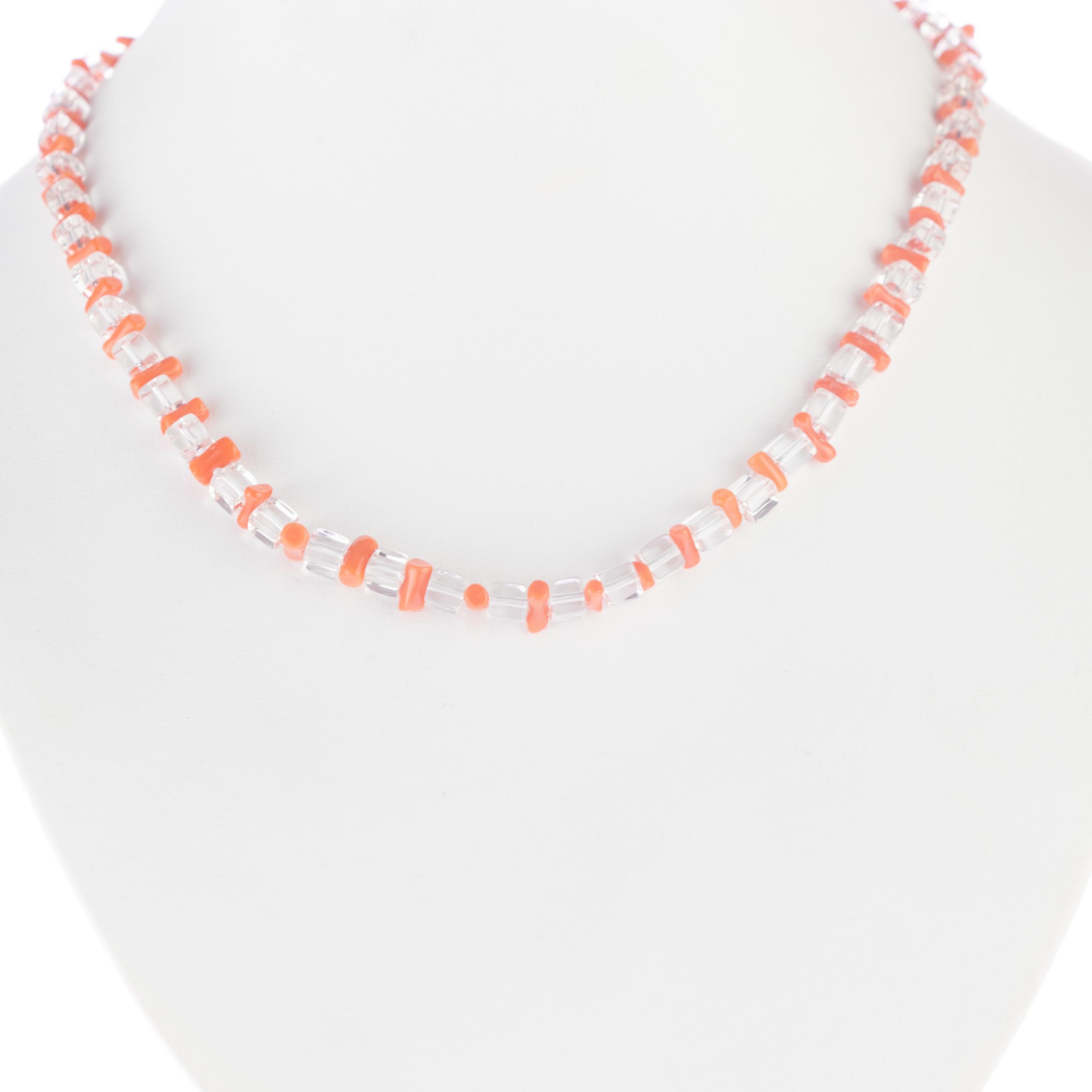 A fantastic necklace to brighten up your summer outfits. Composed with materials that shine with their own light.

Handmade with ethical precious stones, this modern design is made with red coral and rock crystal.

At Intini Jewels we are committed