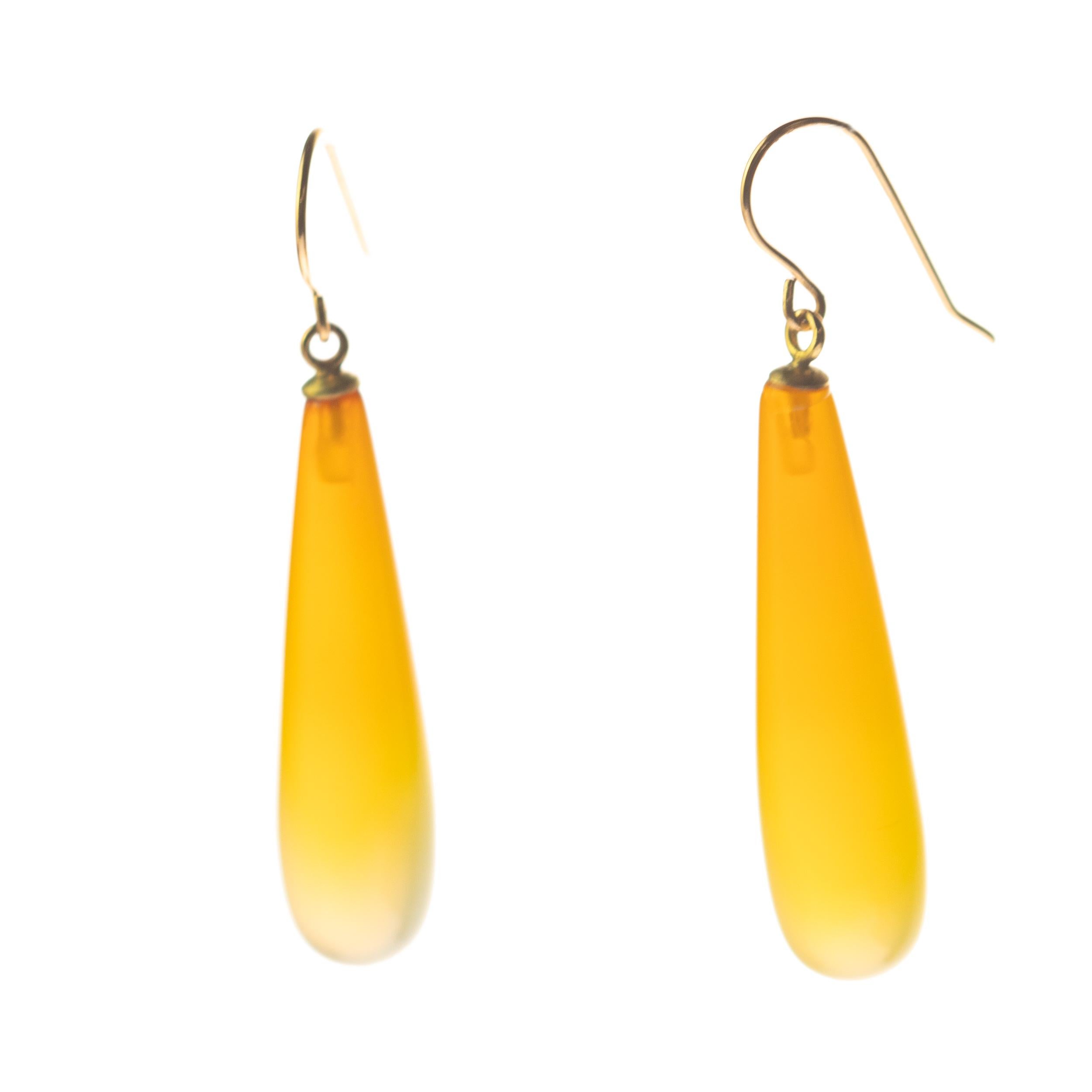This stunning masterpiece with high quality craftsmanship was born in the Intini Jewels workshop. Our designers add all the italian modern style and glamour in one exquisite piece. Stunning Agate teardrops hanging from 18 karat yellow gold.

One of