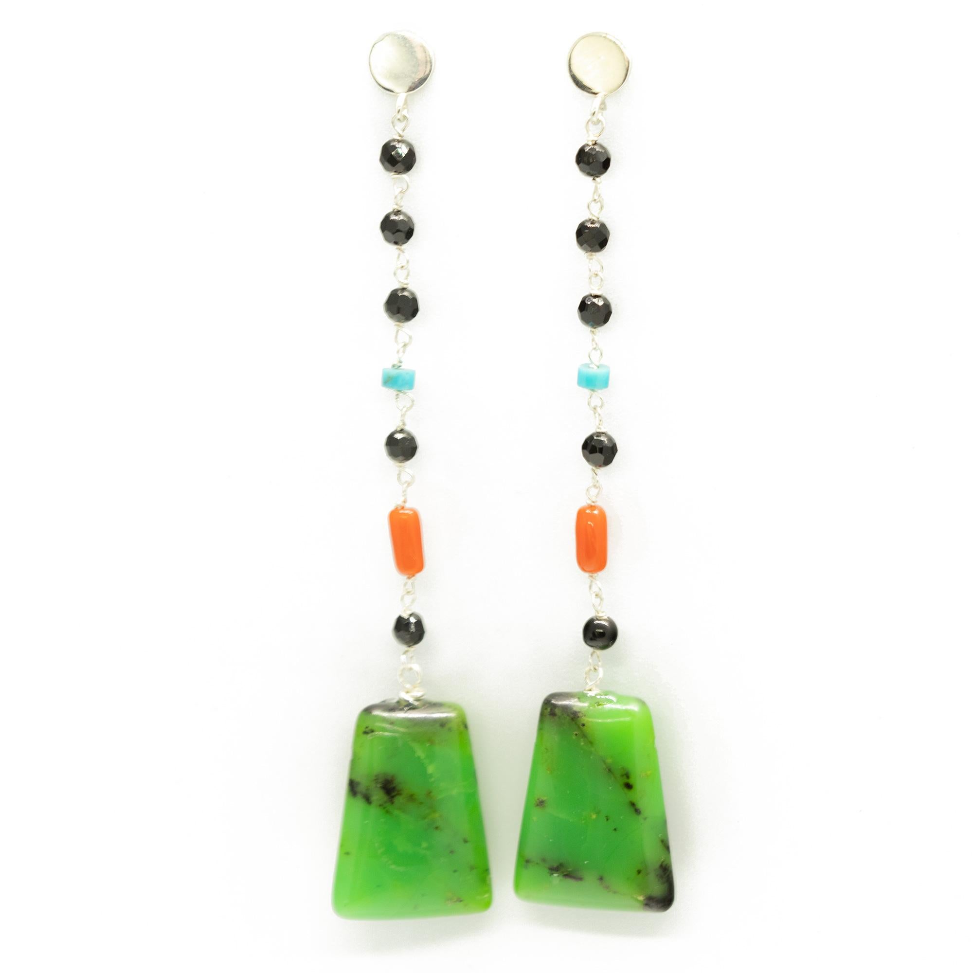 Semiprecious stones of the highest quality create intricate and delightful modern chic earrings.

• 925 Sterling silver
• Zoisite pendant 2.0 x 1.5 cm
• Faceted black agate, Red Coral, Turquoise
• Total length 8.0 cm
• Total Weight 8.0 g, each