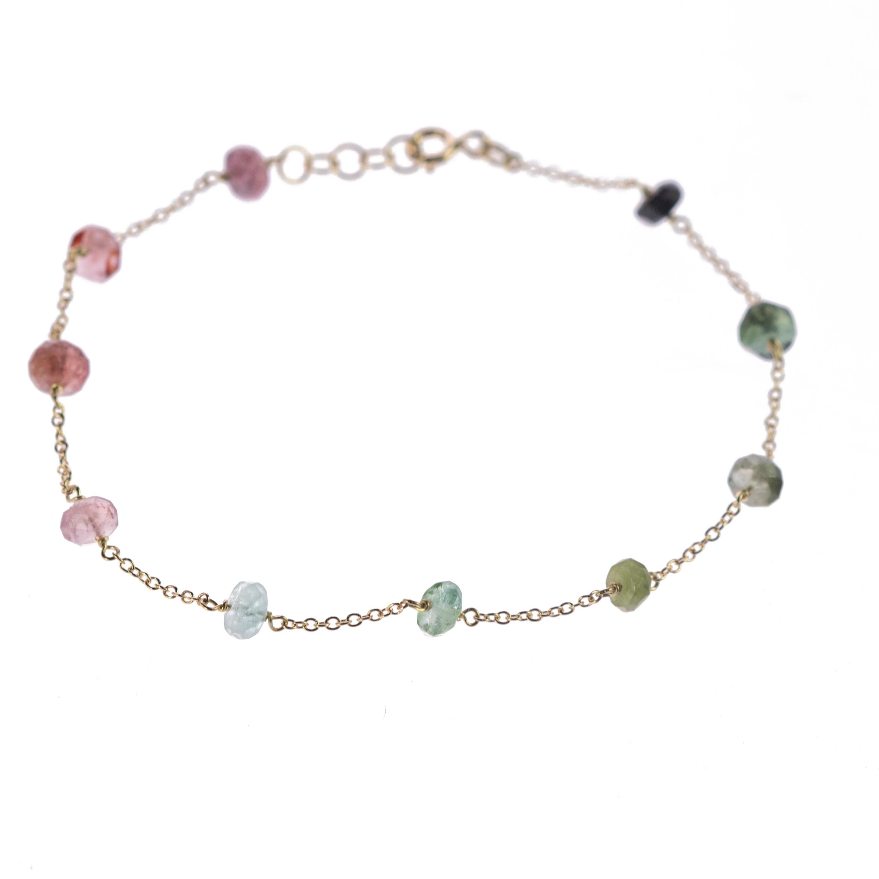 Intini Jewels signature quality on a modern and contemporary design jewel. Ten gems of top quality of tourmaline embellish a delicate 18 karat yellow gold chain bracelet. A jewel full of color and pasion. 

Ancient beliefs say that we should always