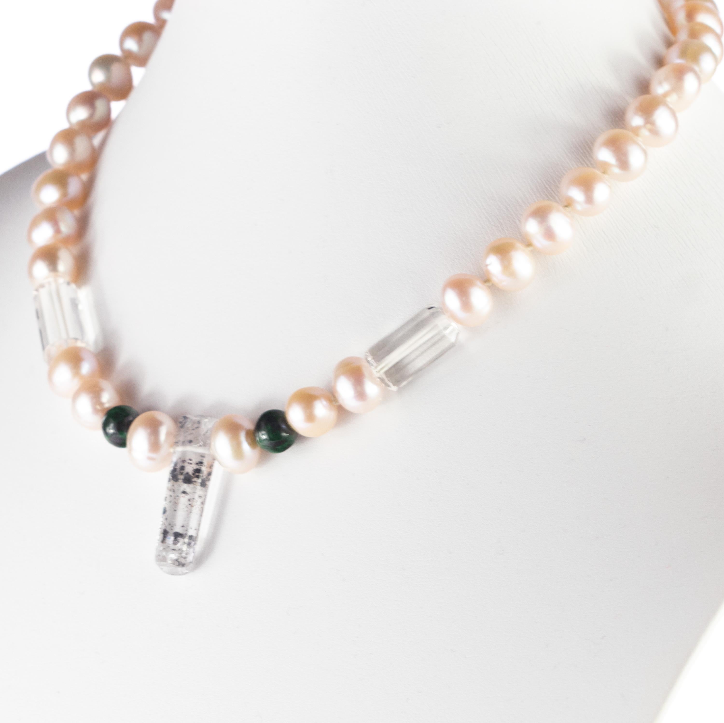 First class natural freshwater natural pearls with an elegant closure in 18k white gold. An iconic collier for an elegant outfit. A timeless design with rock crystal asymmetric pieces and jade spheres. Top quality materials for a Made in Italy