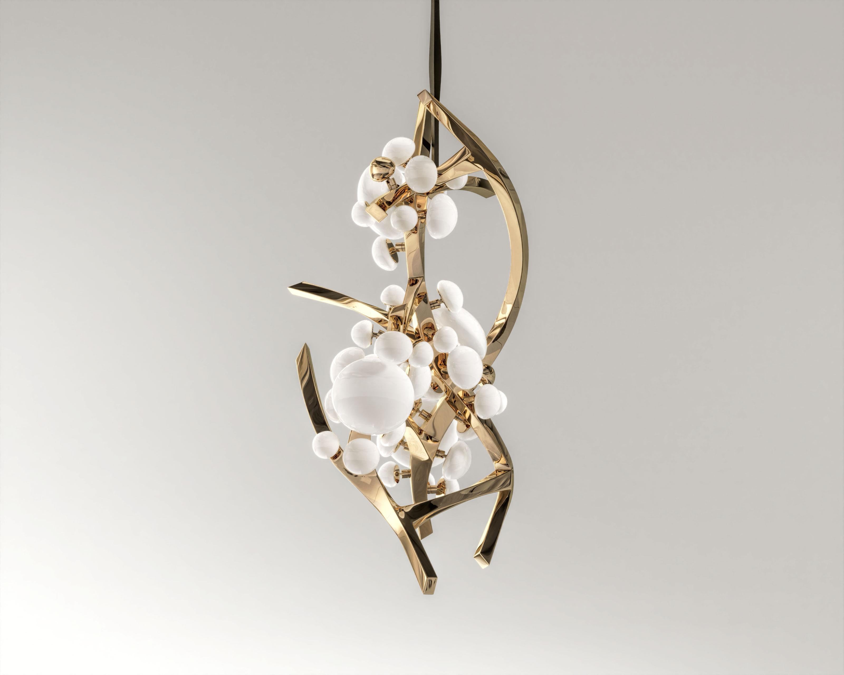 Intıma Vertical Polished Bronze Chandelier
The “Intima” Luxury Handmade Chandelier is an exquisite work of art that seamlessly merges the elegance of neural networks. This chandelier serves as the focal point of any space, exuding sophistication and