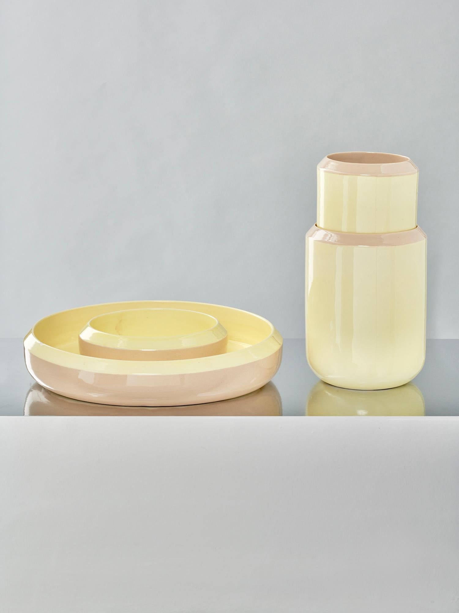 In INTO EACH OTHER ceramics by Maddalena Casadei the glossy interconnection between two colored surfaces refers to the value of new cross-cultural exchanges.

Details:
Color: Yellow and beige
Material: 100% Mediterranean white clay
Technique: