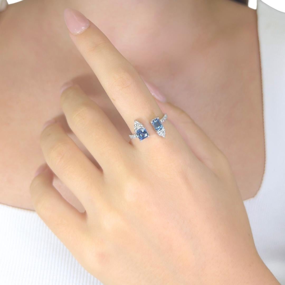 Intricate 1.34ct Tanzanites and Diamonds Ring in 18k White Gold - IGI Certified

Graceful and refined, this 18K white gold ring features two captivating tanzanites with 1.01ct total in delicate fancy shapes, glowing with a serene light blue hue.