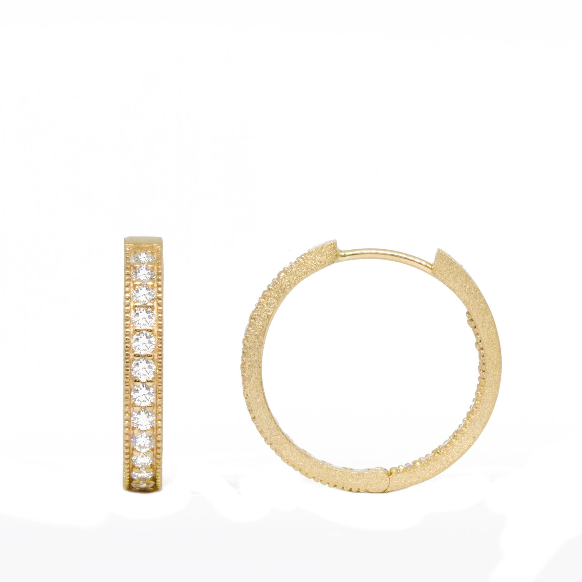 The Gemma re-define glamorous and designed to stand out, but they’re not going to bump into your face! Our collectors really love these gold hoop earrings because they’re richly detailed with intricate milgrain edges, and nice and thick for showing
