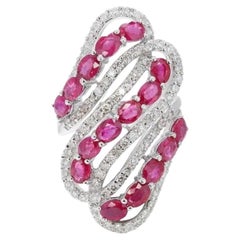 Bague complexe en or blanc 18 carats en forme de spirale avec rubis de 3,20 carats et diamants latéraux