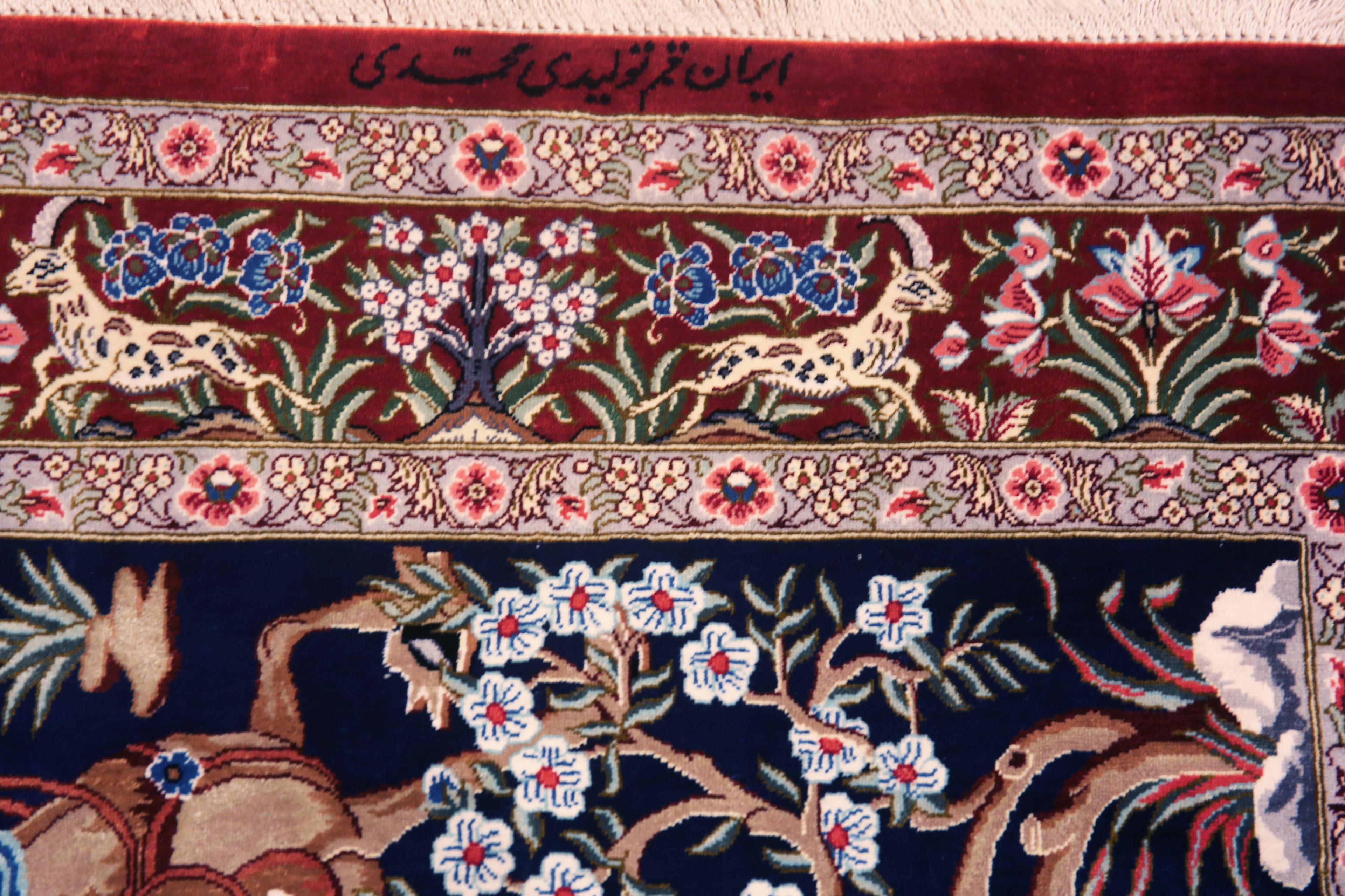 Intricate Blue Persian Small Hunting Scene Vintage Qum Silk Luxury Rug, country of origin: Persian Rugs, Circa date: Vintage