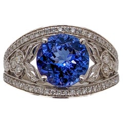 Bague de conception complexe avec accents de diamants en or blanc 14 carats rond de 9 mm