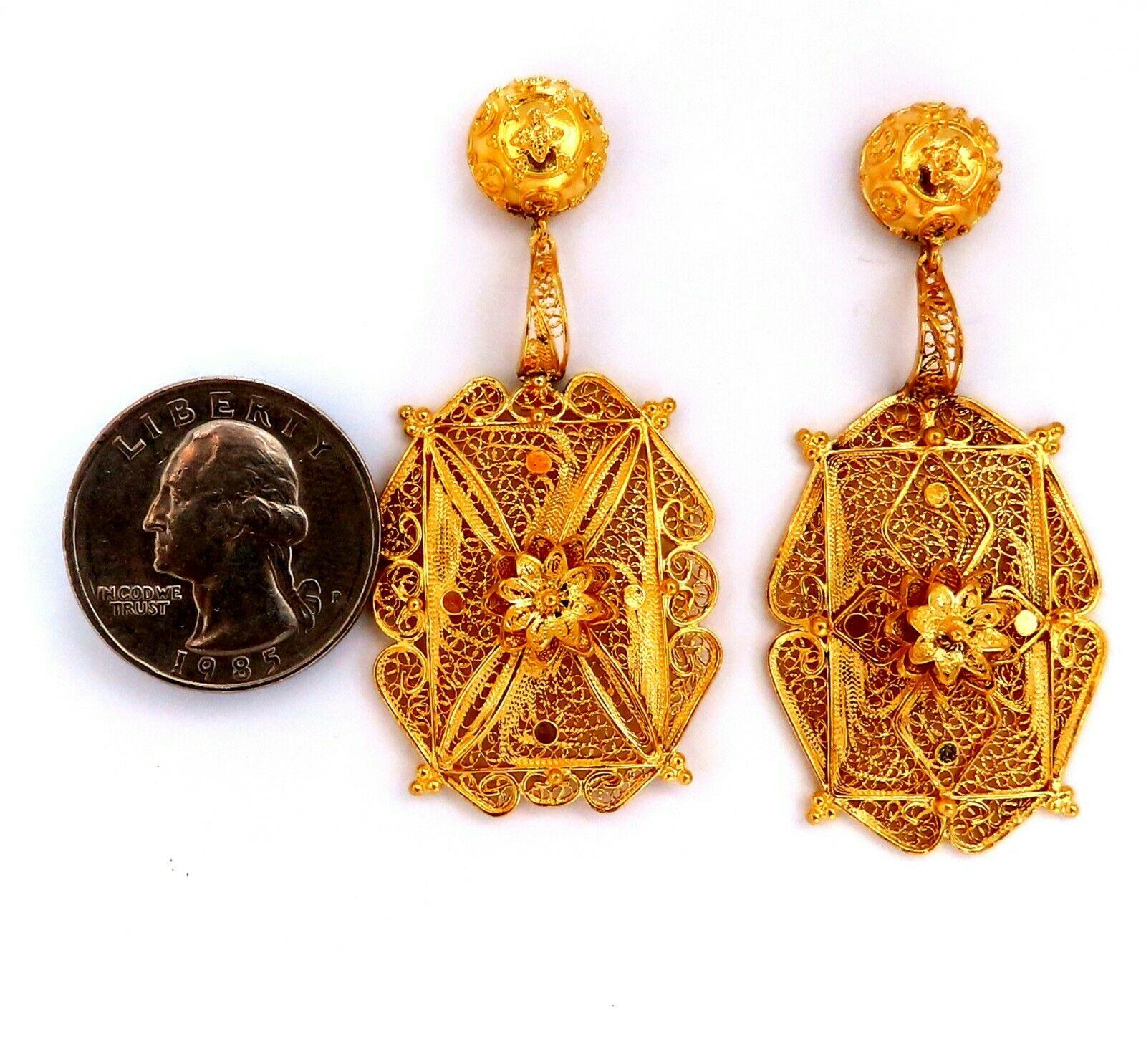 Intricate Detail Dangle Earrings

Measurements: 

2 x 1.05 inch

Depth: .23inch

9.3 grams / 14kt. Yellow Gold

Earrings are gorgeous made
