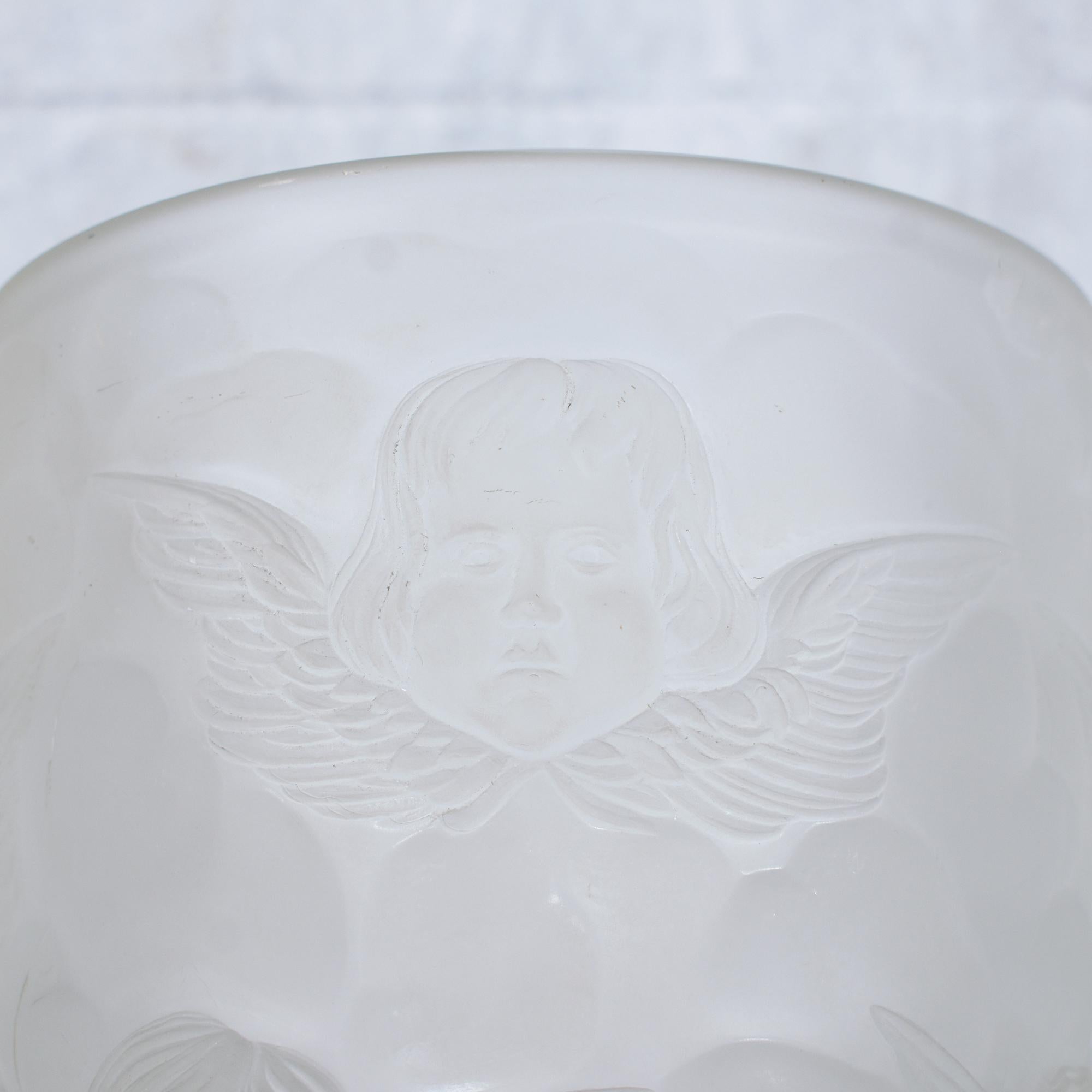 Embrace the captivating beauty of our Glass Vase, a testament to skilled artisanship and graceful design. This vase, in good condition, is a marvel of glass craftsmanship, featuring a refined frosted finish that lends it both texture and elegance.