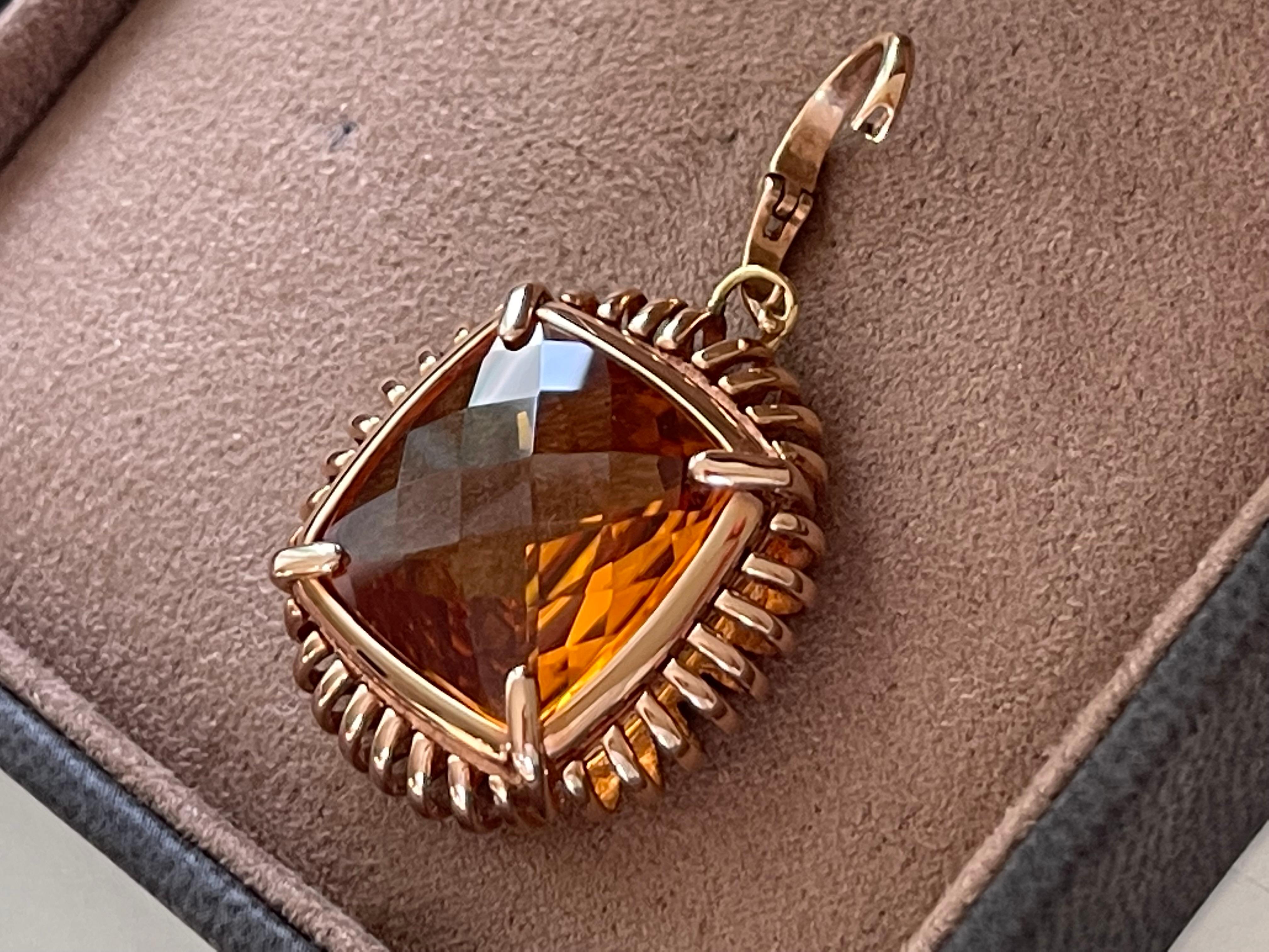 Lovely intiricate 18 K pink Gold Pendant with a fancy cut yellow Citrine. Italian Design, modern and contemporary for the fashion conscious woman!
The pendant can be added to any chain of your desire. Clip mechansim for easy use. 
It measures 2.80