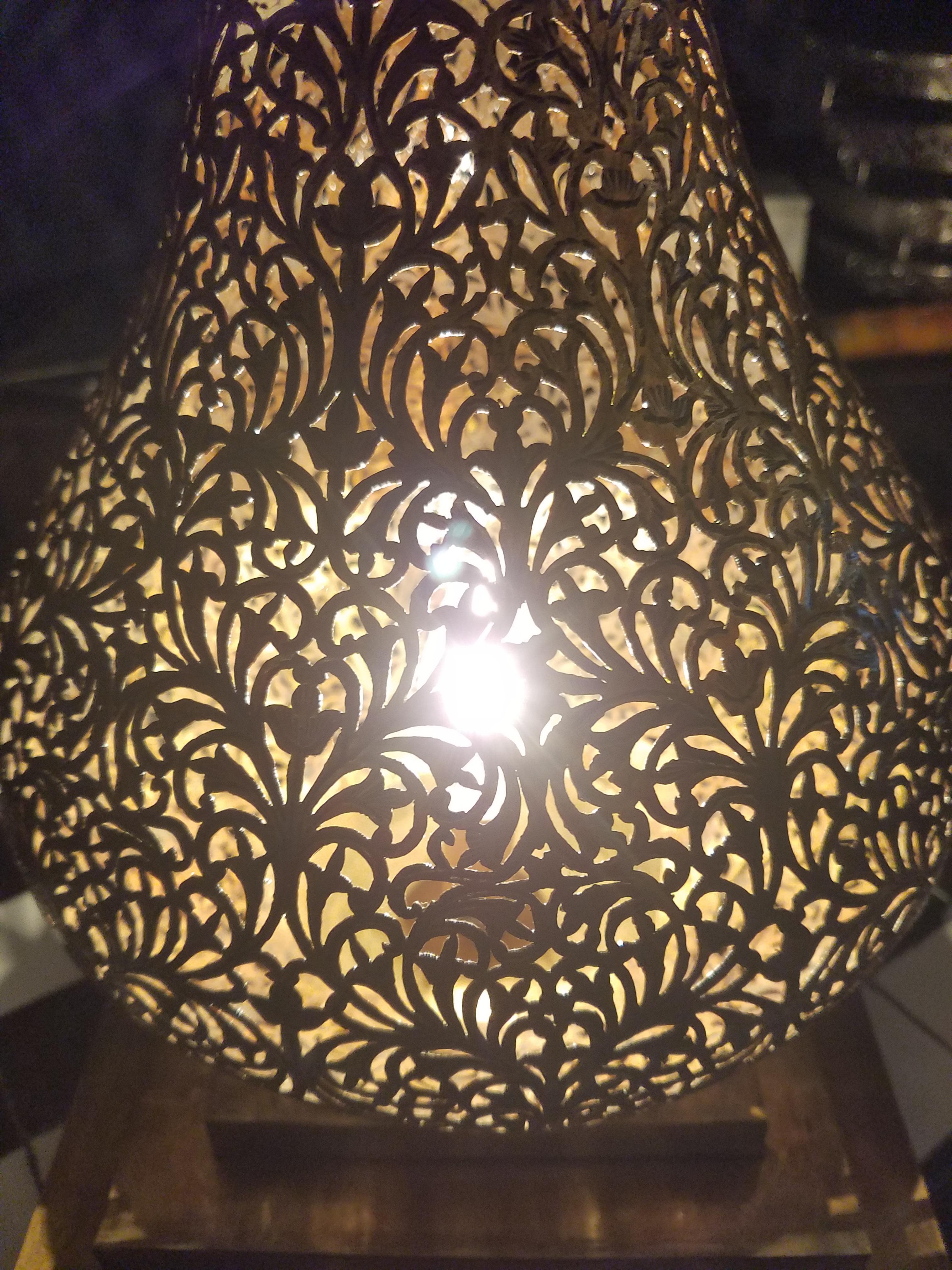 Made from pure copper, these beautiful Moroccan table lamps or lanterns are sure to be show-stoppers anywhere in your home. Each is handmade using ancient artisan methods which consist of puncturing the surface with a unique, elaborate design, so