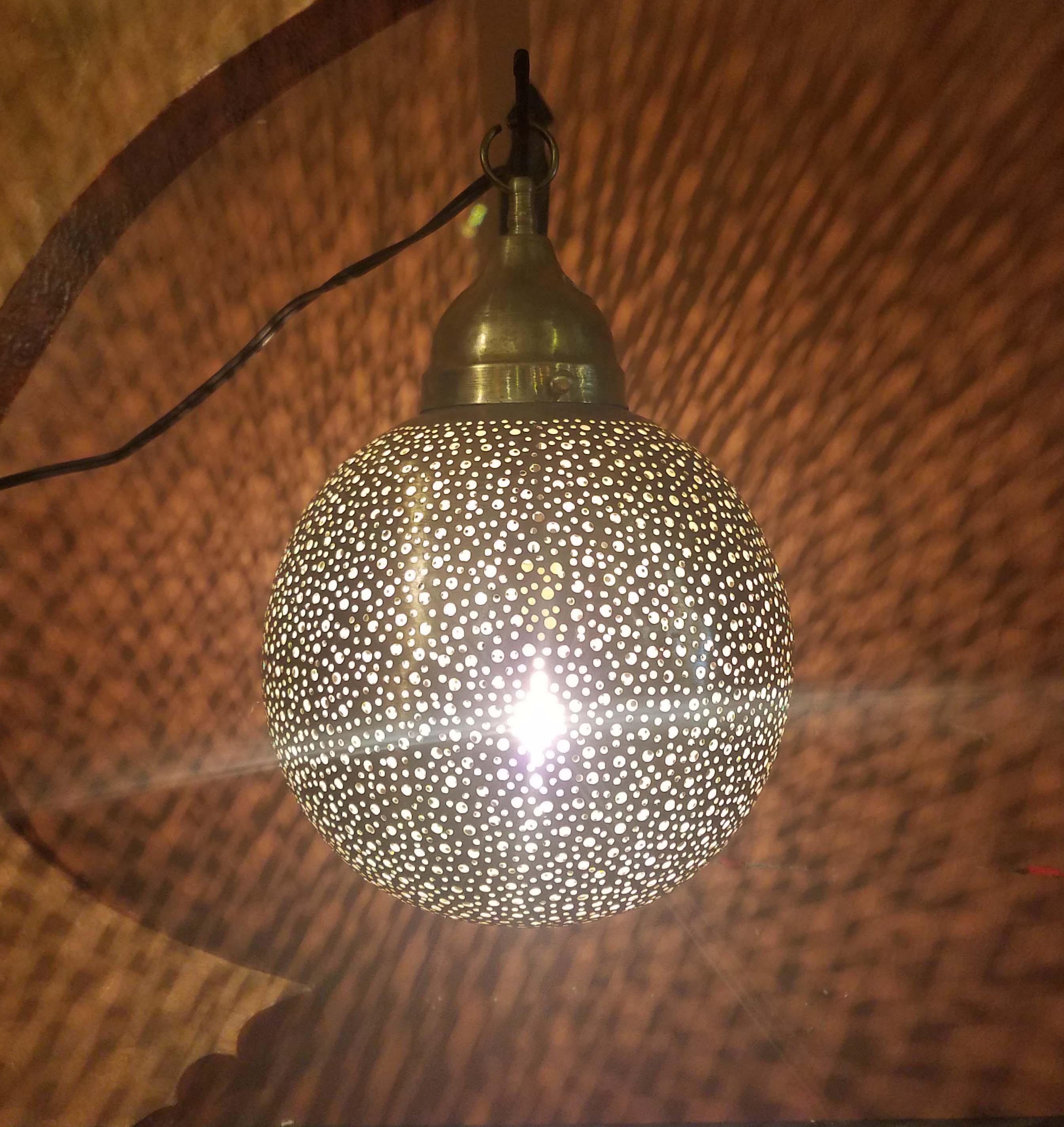 Made from pure copper, these beautiful wall and ceiling lamps are sure to be show-stoppers anywhere in your home. Each is handmade using ancient artisan methods which consist of puncturing the surface with a unique, elaborate design, so that, with a