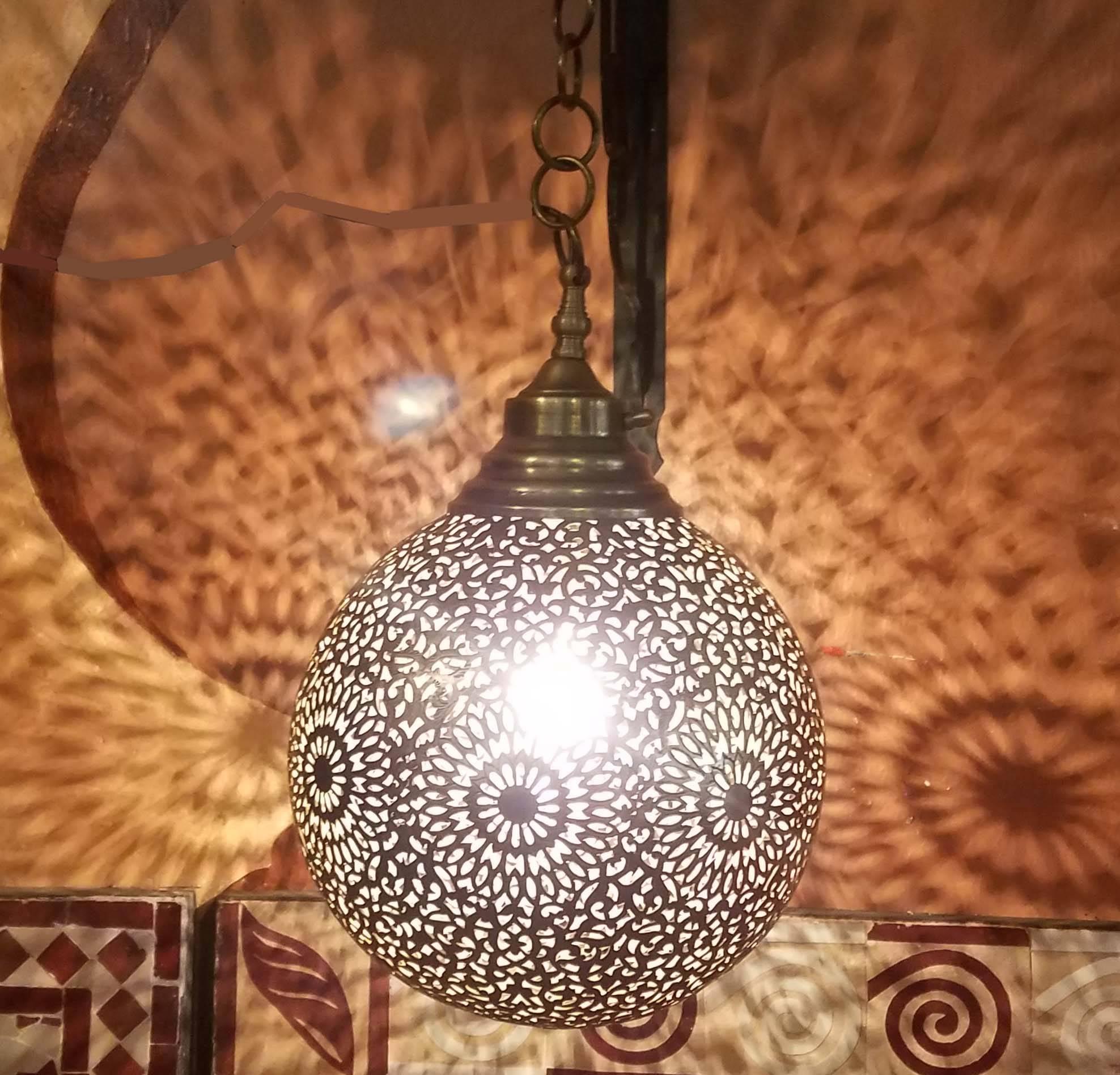 Made from pure copper, these beautiful Moroccan hanging lamps or lanterns are sure to be show-stoppers anywhere in your home. Each is handmade using ancient artisan methods which consist of puncturing the surface with a unique, elaborate design, so