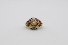 Intricate Oriental Ring with Cabochon Rubies, Sapphires, and Other Gemstones