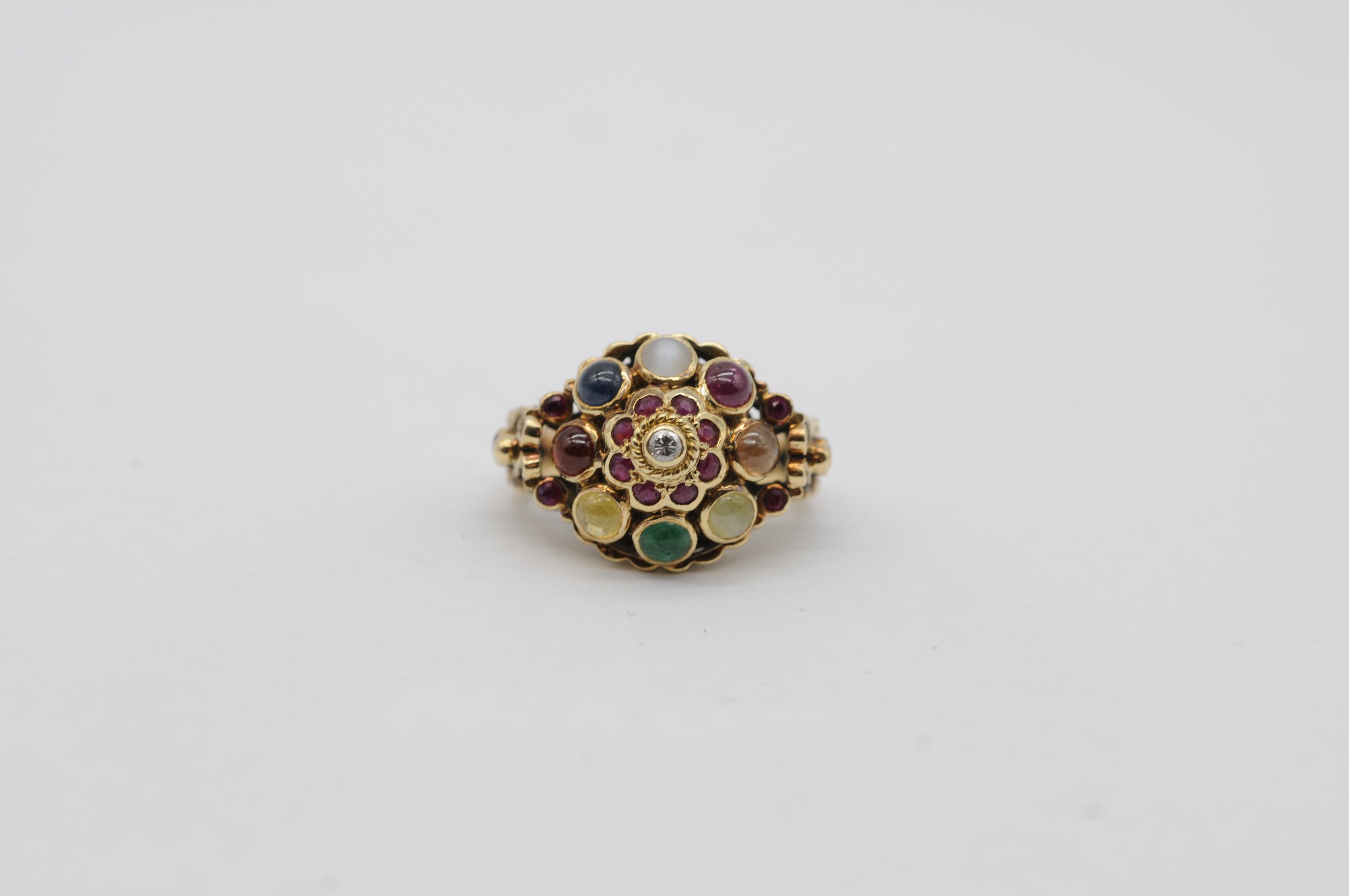 Intricate Oriental Ring with Cabochon Rubies, Sapphires, and Other Gemstones In Good Condition For Sale In Berlin, BE