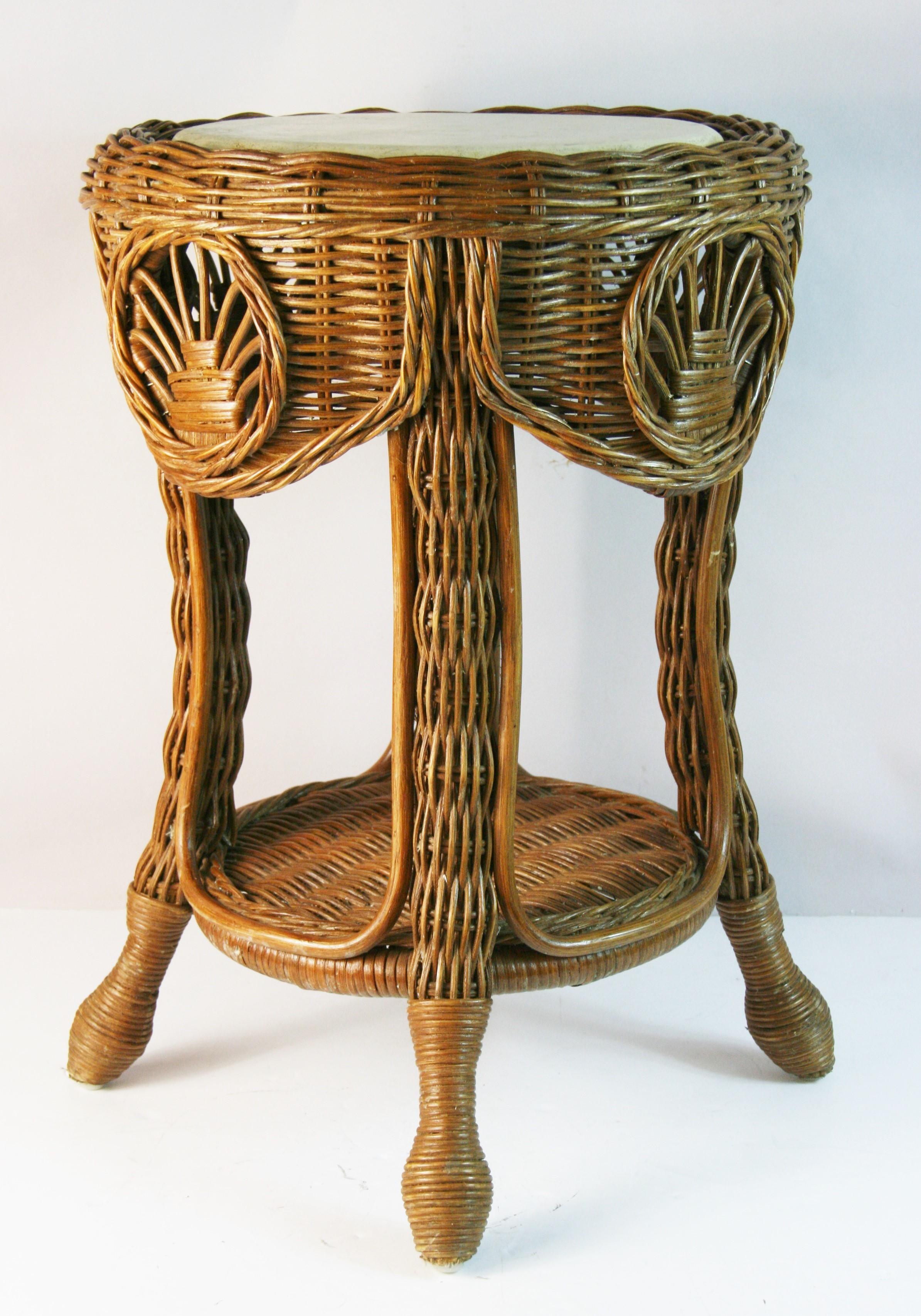1828 French Rattan and wicker side/center table with marble top.
