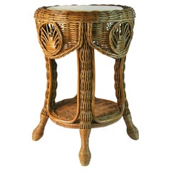 Tavolino/centro in vimini e rattan con piano in marmo travertino