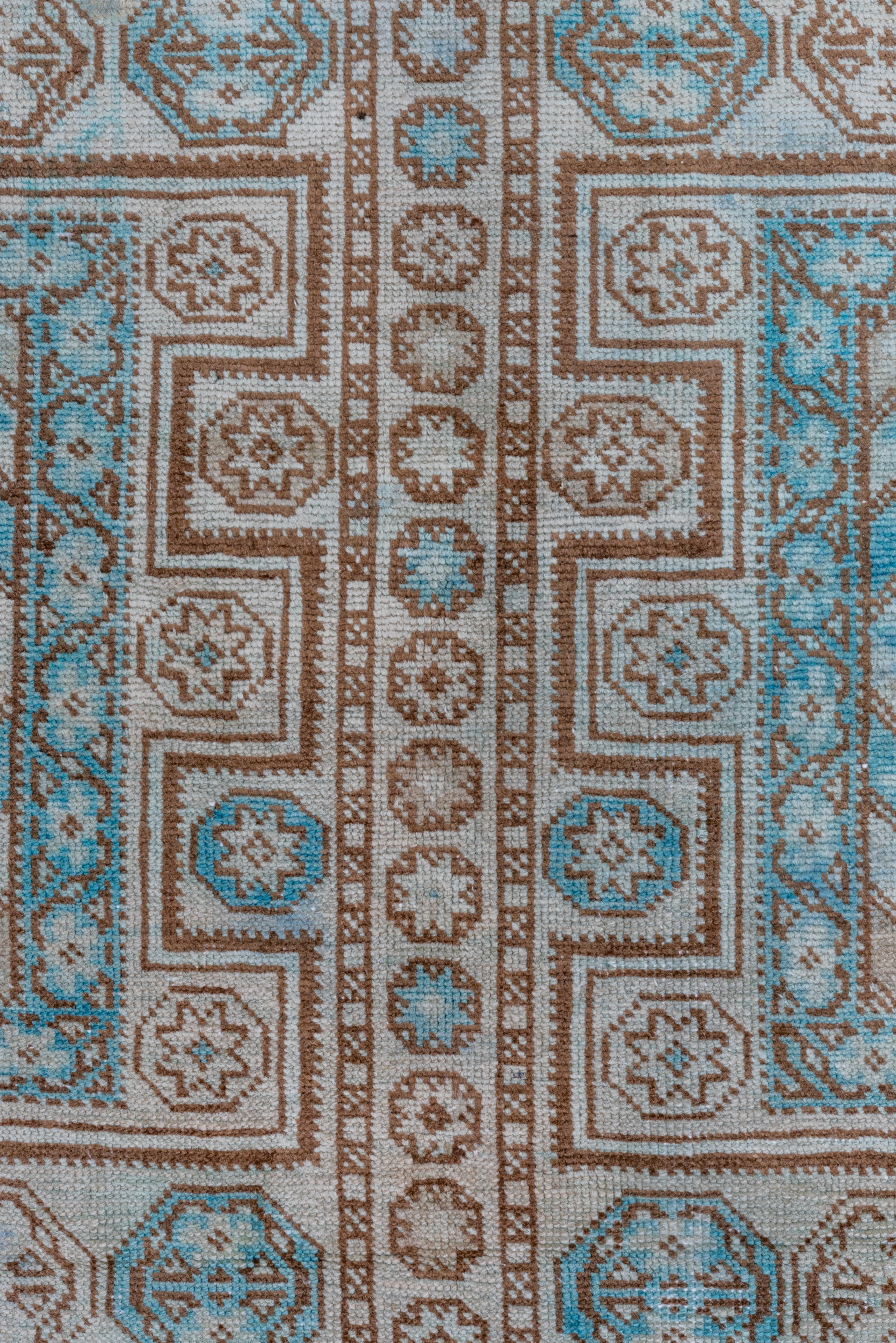 Wool Intricate Symmetry: A Turkish Rug's Dance of Teal and Taupe in Geometric Splendo For Sale