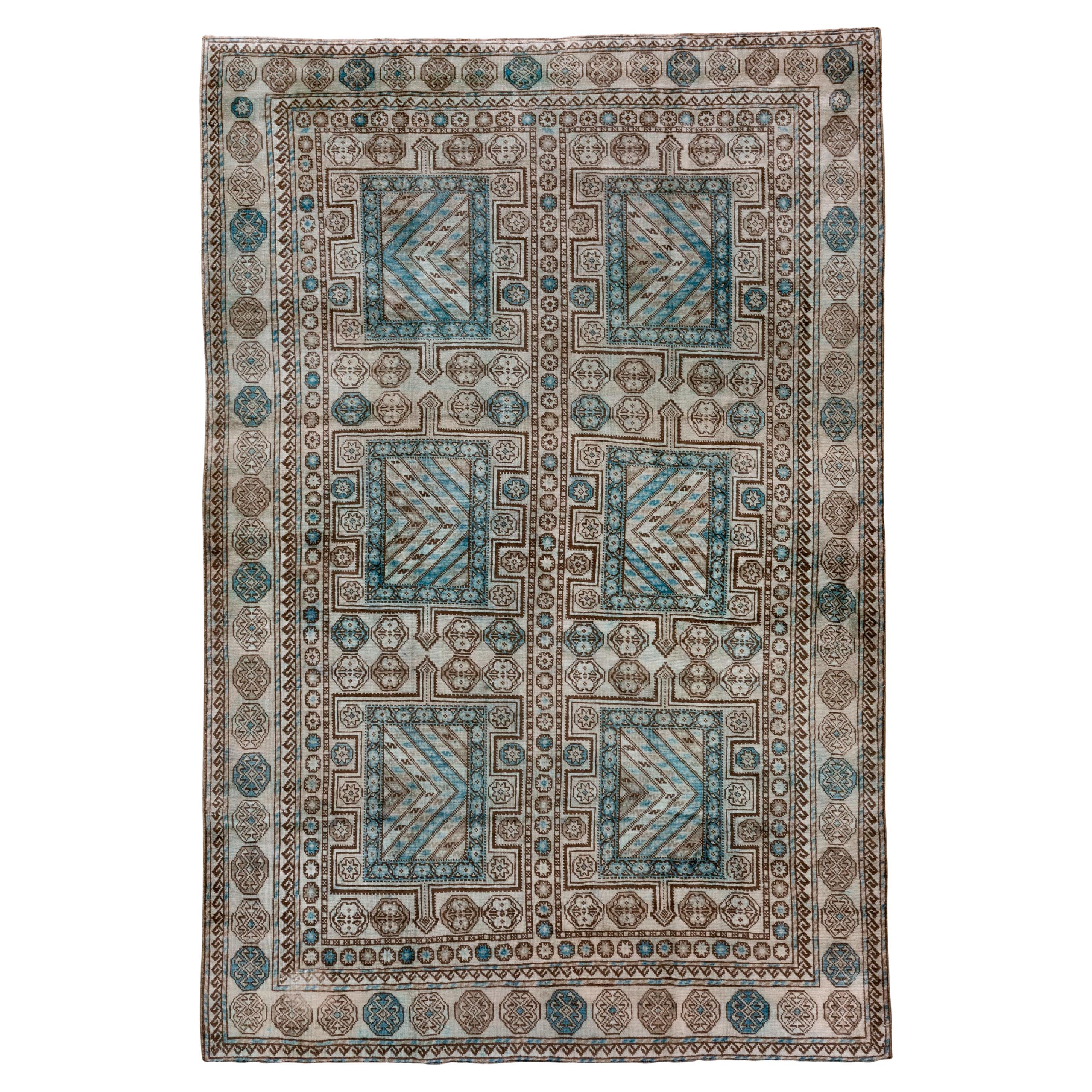 Intricate Symmetry: A Turkish Rug's Dance of Teal and Taupe in Geometric Splendo For Sale