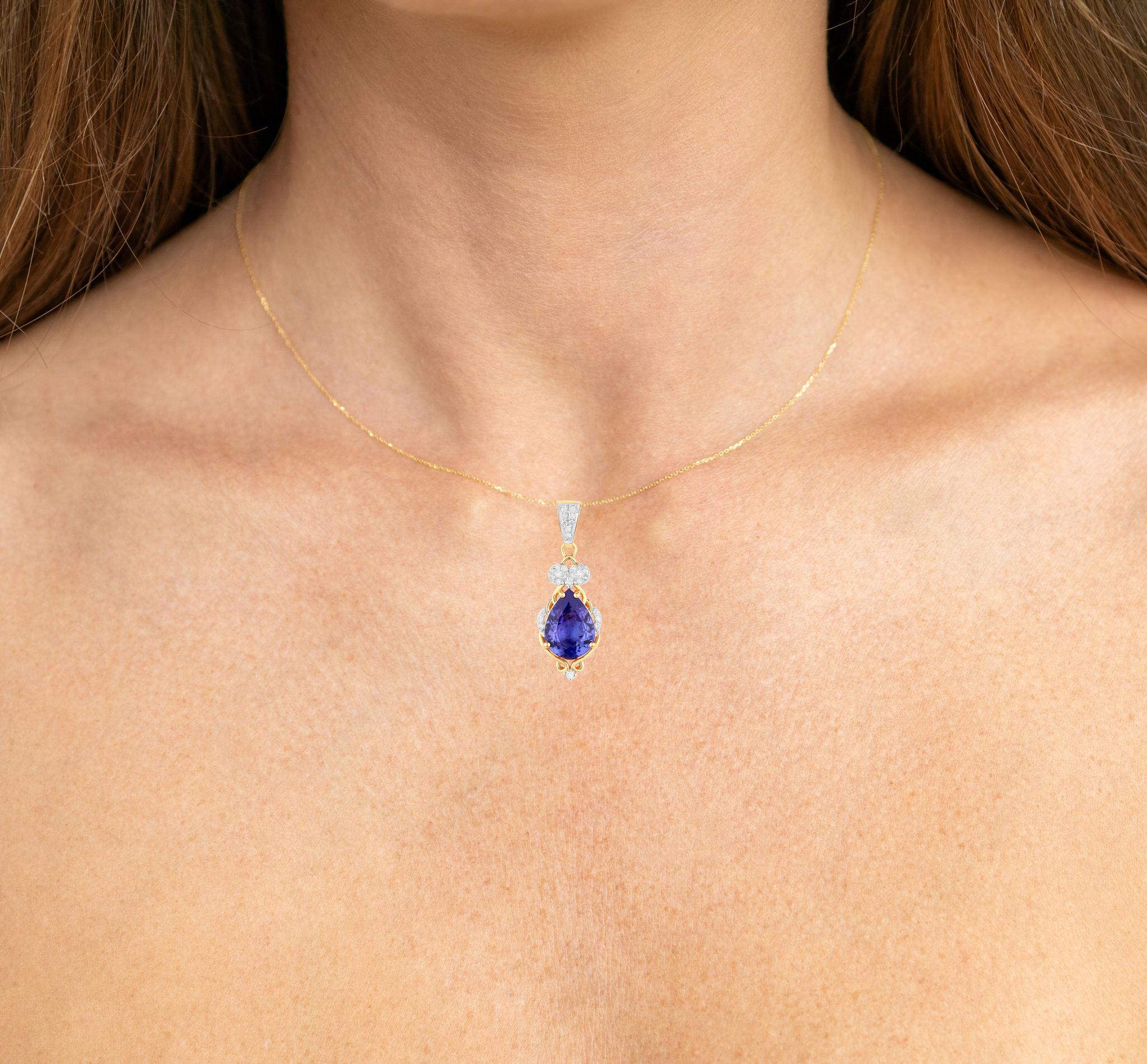 It comes with the Gemological Appraisal by GIA GG/AJP
All Gemstones are Natural
Tanzanite = 2.08 Carats
Cut: Pear
28 Round Diamonds = 0.14 Carats
Metal: 14K Yellow Gold
Pendant Dimensions: 34 x 10.5 mm