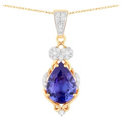 Intricate Tanzanite Pendant Necklace Diamond Setting 2.2 Carats Total 14K Gold