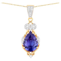 Intricate Tanzanite Pendant Necklace Diamond Setting 2.2 Carats Total 14K Gold