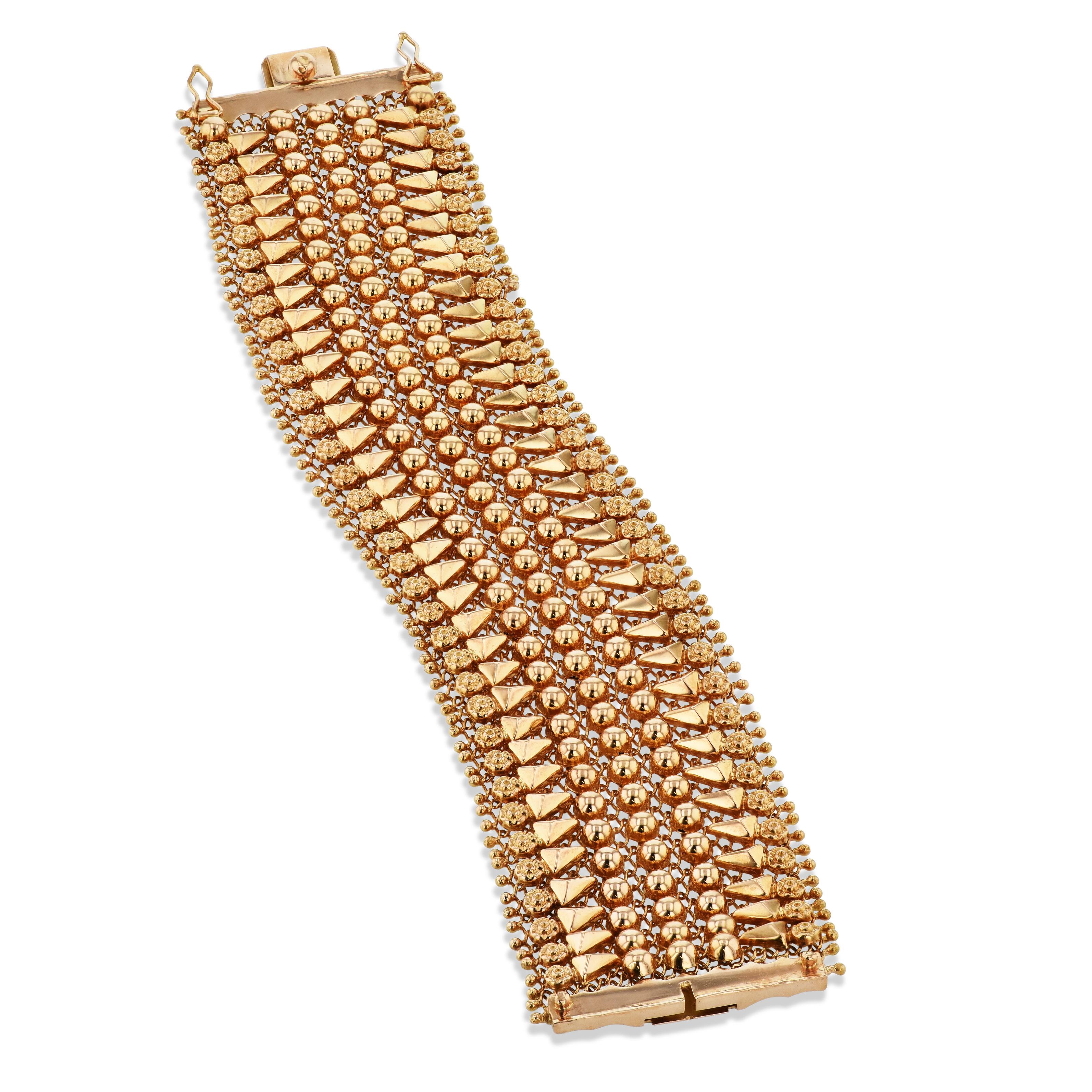 This eye catching 18 karat yellow gold estate bracelet is so beautiful! It is sure to lend a hint of luxury to any attire!

It measures 37.5 mm wide and is 7 inches long. 

-18 karat yellow gold
-Estate bracelet
-7 inches long
-37.5 mm wide
-Estate