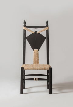 Intricately Carved and Handwoven Fireside "Ines Chair" by Chiara Andreatti