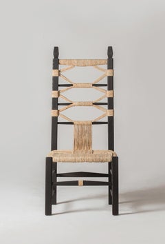 Intricately Carved and Handwoven Fireside "Nannai Chair" by Chiara Andreatti