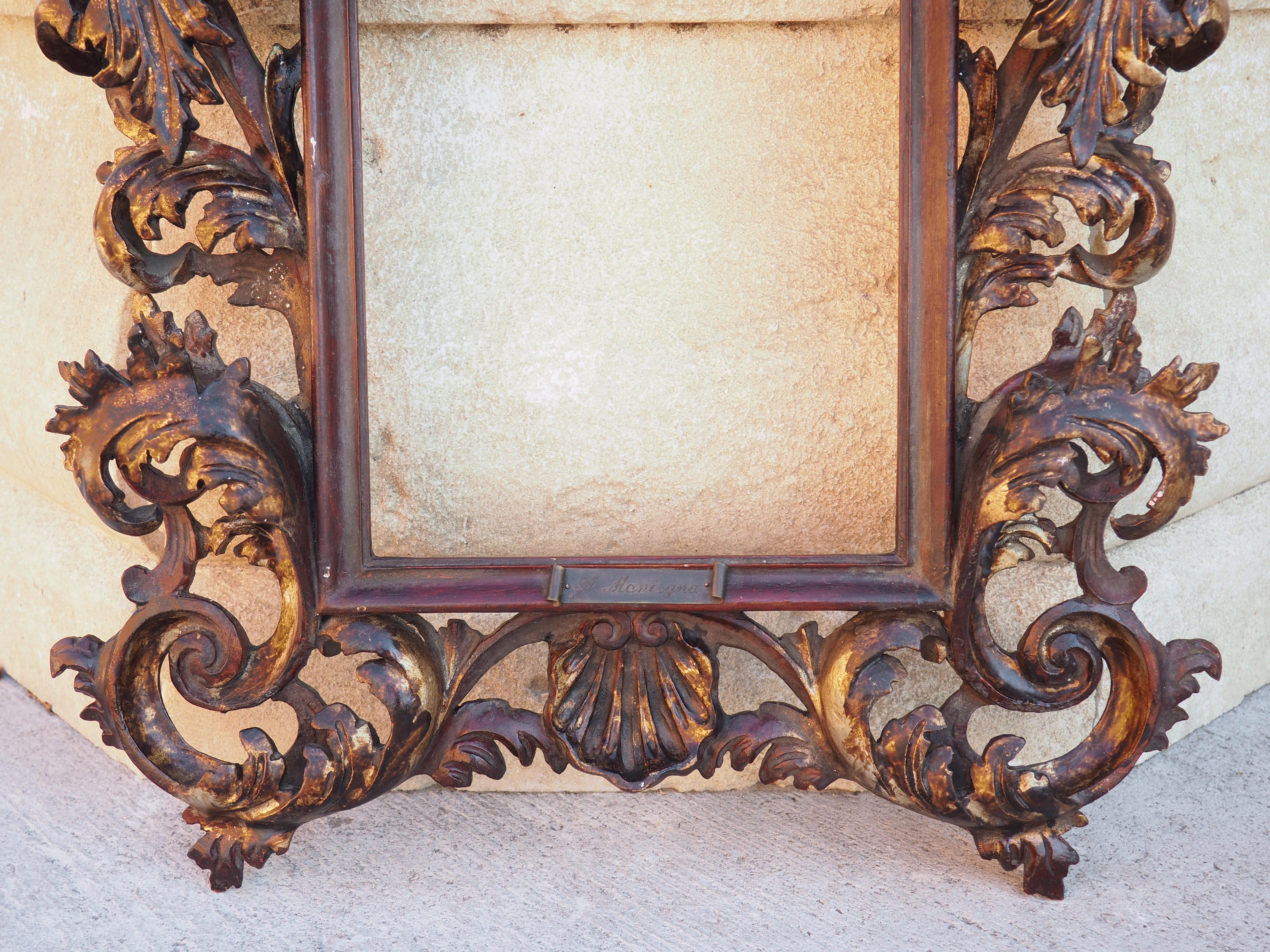 This polychromed frame was hand-carved in Florence, Italy, in the 1800’s. Intricate carvings gracing all four sides is typical of frames made in this part of Italy from the 1600s to late 1800’s.

Both sides are adorned with airy and graceful foliate