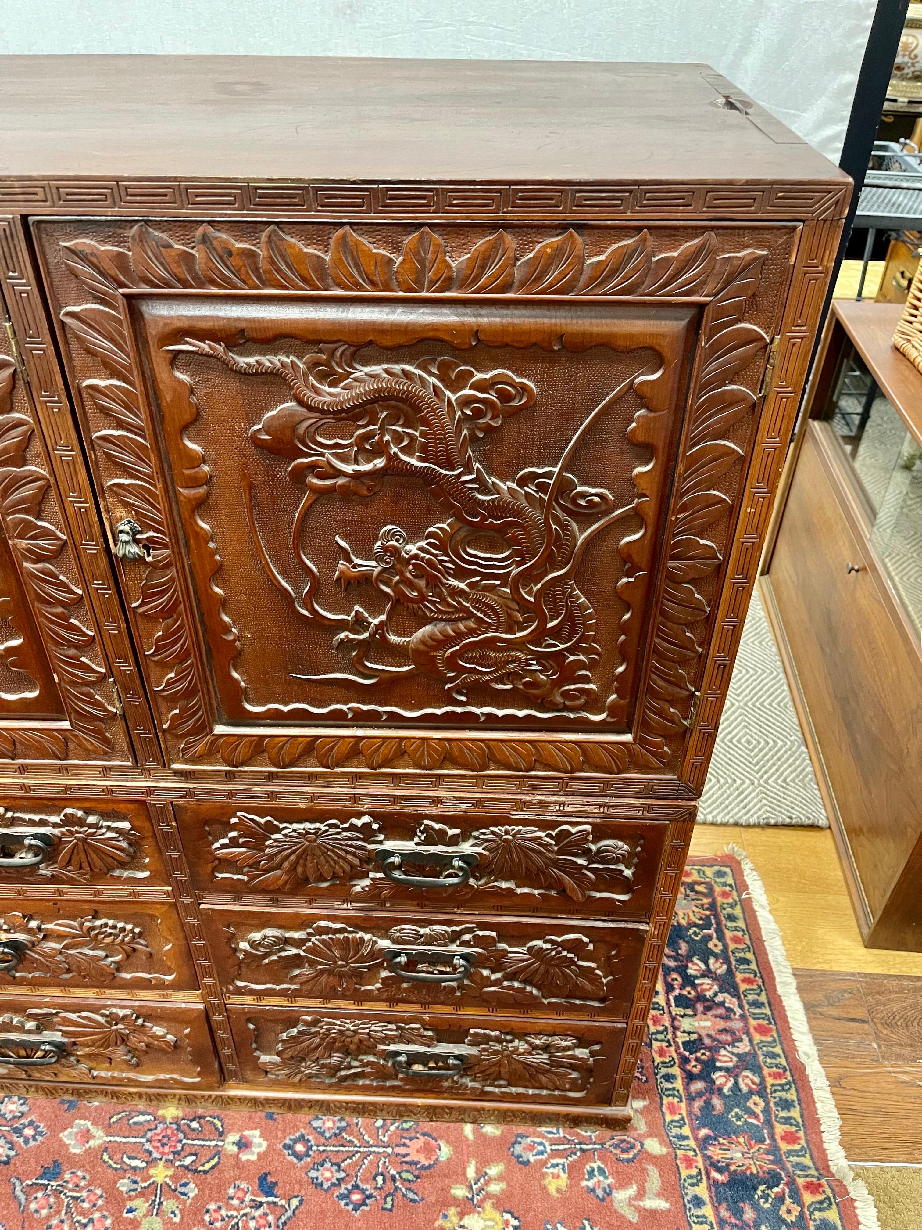 Intricately Carved Antique Asian Two-Piece Cabinet For Sale 1