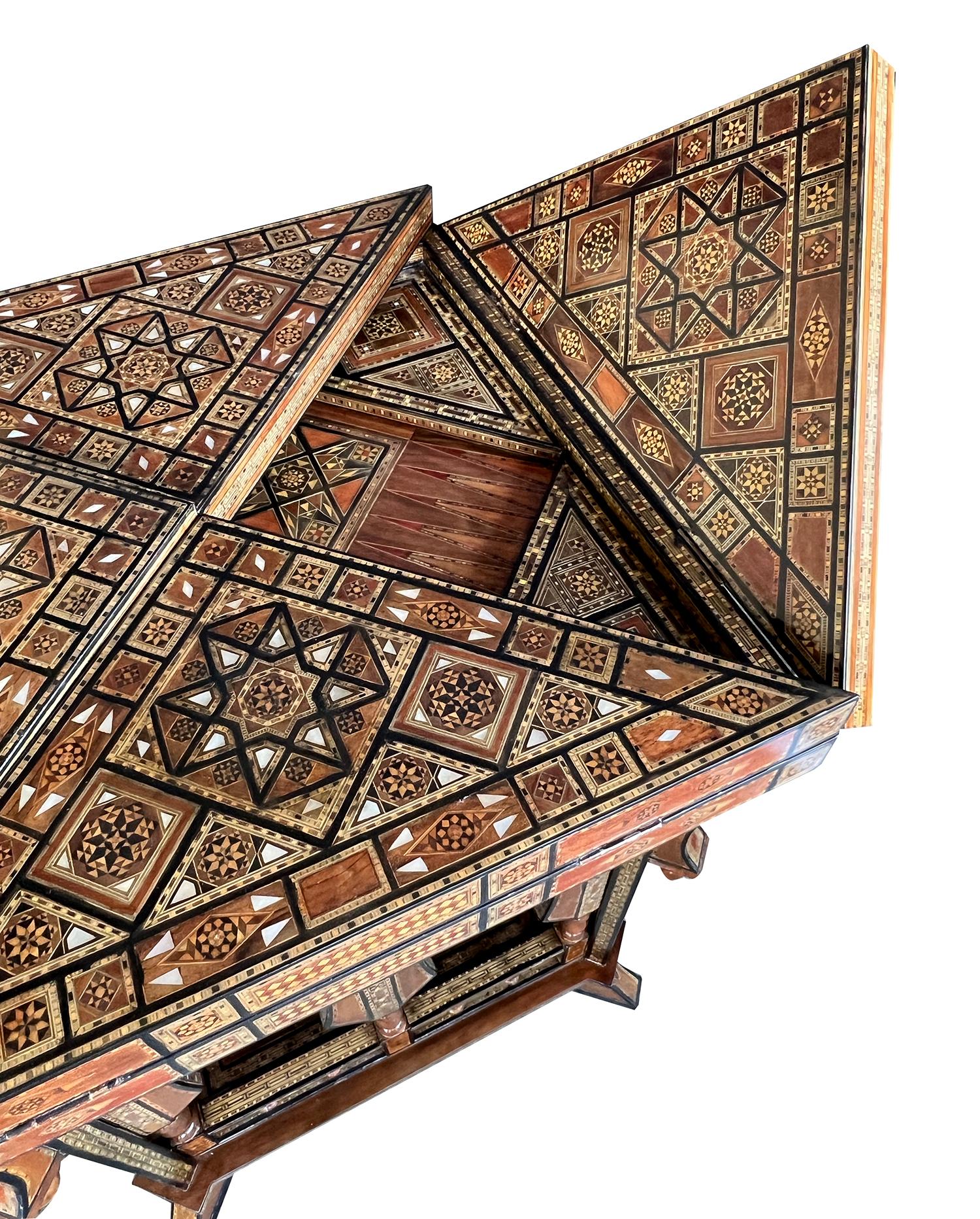 Early 20th Century Intricately Inlaid Moorish Square Game Table with Pivoting Handkerchief Top For Sale