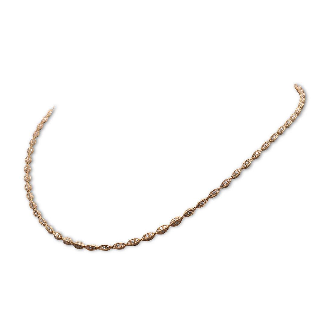 An elegant necklace intricately crafted in 18 karat rose gold and set with an estimated 9 carats of sparkling round brilliant diamonds.  The delicate links feature a geometric shape that is at once classic and unique.  Perfectly wearable and