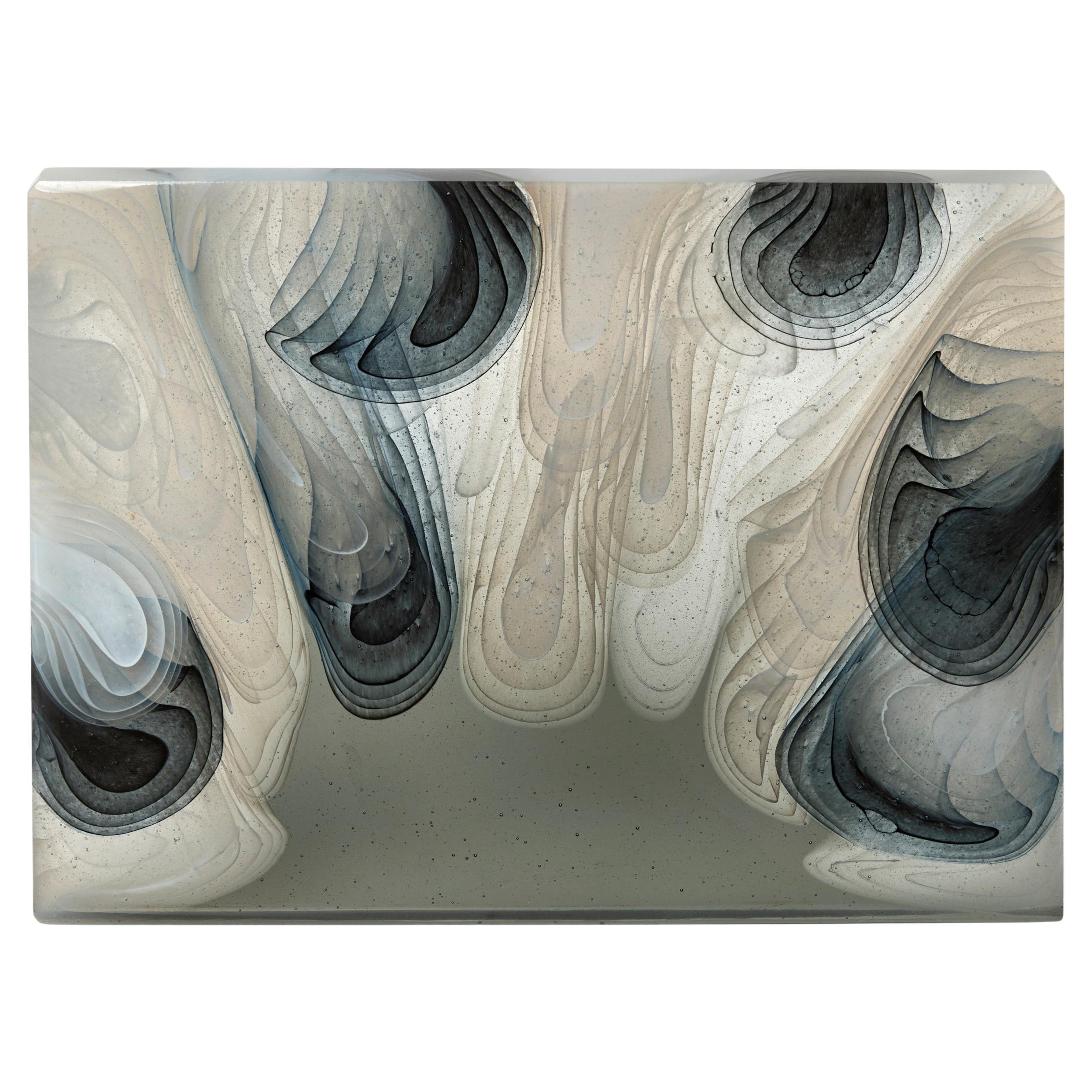 Introspection, fluid black, white 
grey cast glass sculpture by Helen Restorick