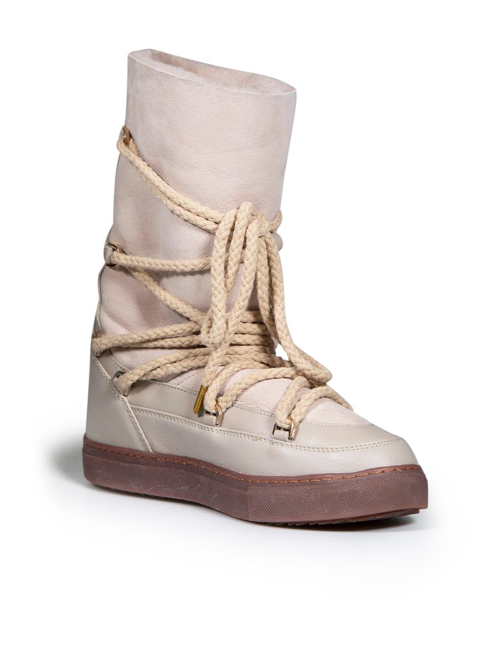 CONDITION is Never worn. No visible wear to boots is evident, however there is a small mark to the right-side of the right boot due to poor storage on this new Inuikii designer resale item.
 
 
 
 Details
 
 
 Beige
 
 Suede
 
 Boots
 
 Round toe
 
