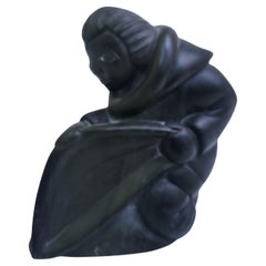 Inuit Folk Art Hard Carving of a man with a Saw in Soapstone C1975
